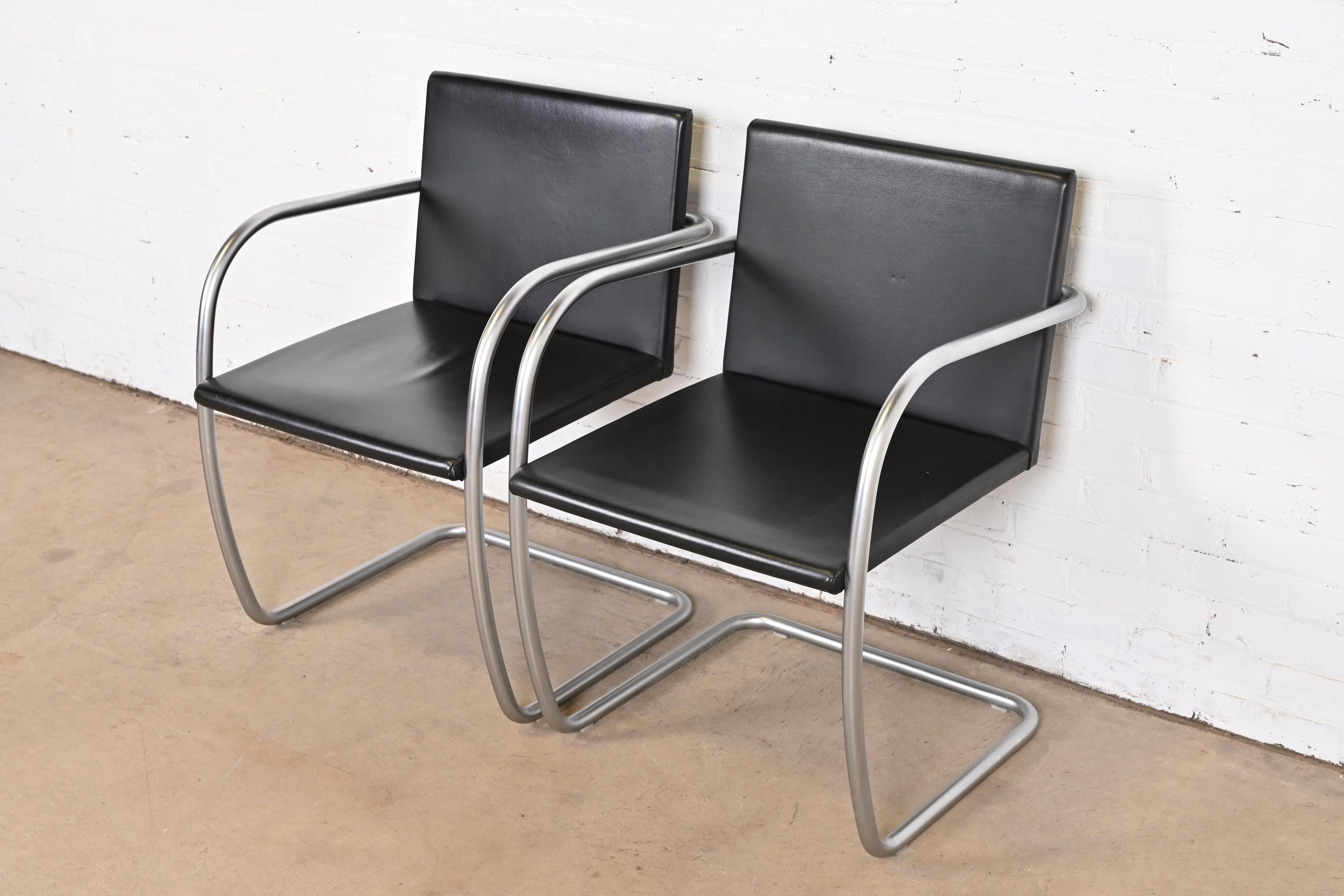 An exceptional pair of Mid-Century Modern Brno tubular club or lounge chairs

Designed by Ludwig Mies van der Rohe in 1930 for the Tugendhat House

Produced by Knoll

USA, Late 20th Century

Cantilevered chrome-plated steel frames, with black