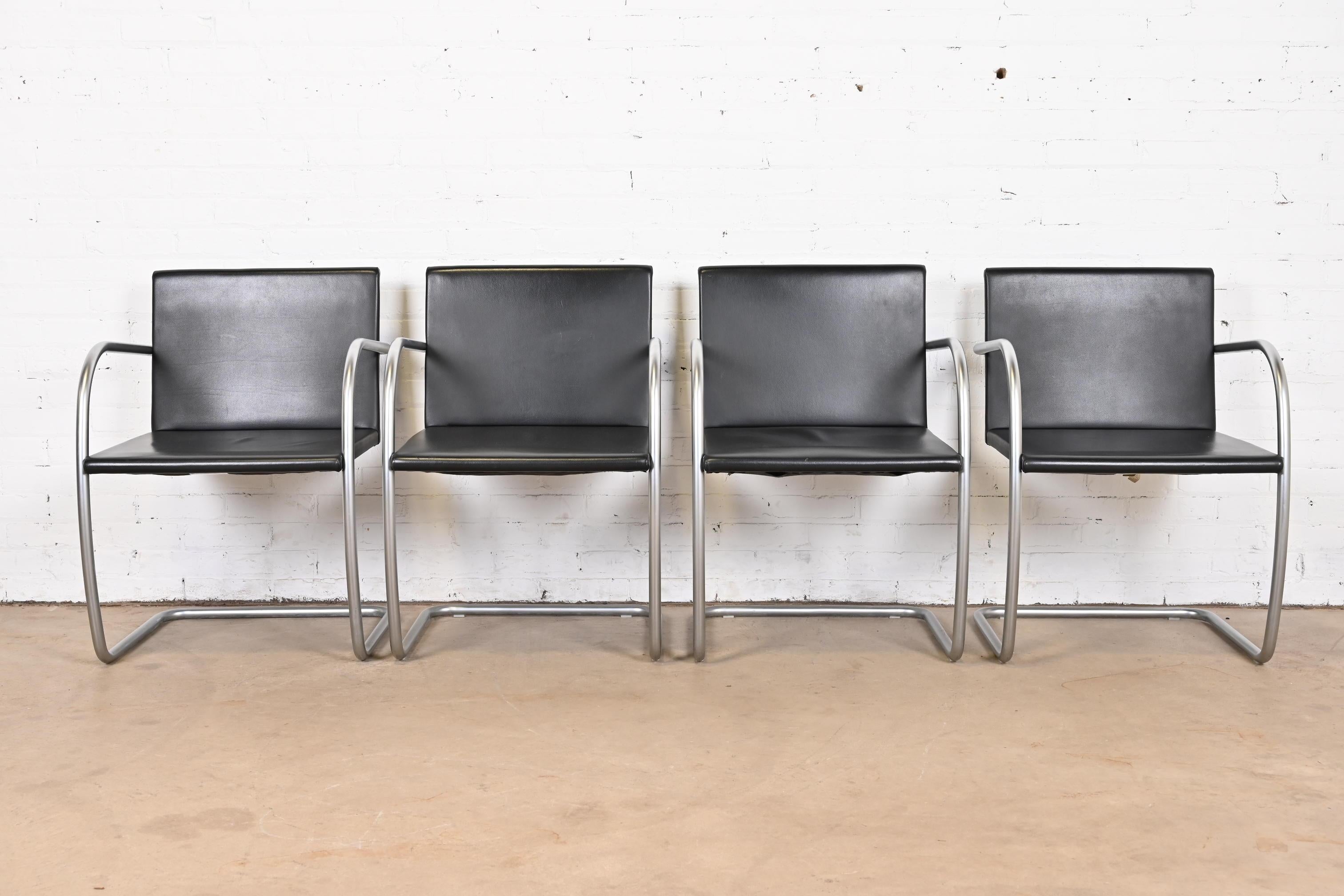 An exceptional set of four Mid-Century Modern Brno tubular club or lounge chairs

Designed by Ludwig Mies van der Rohe in 1930 for the Tugendhat House

Produced by Knoll

USA, Late 20th Century

Cantilevered chrome-plated steel frames, with black