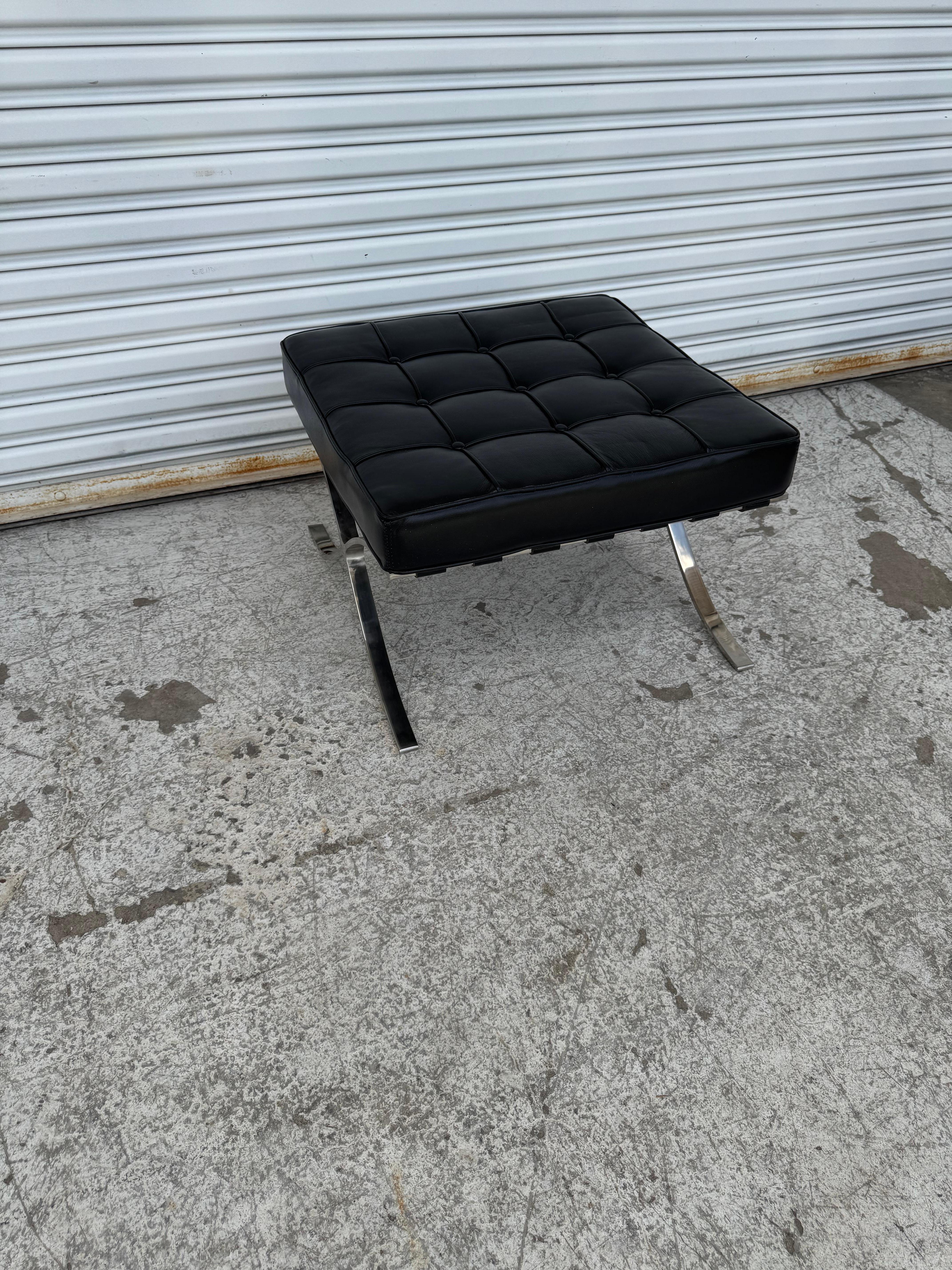 A classic modern design by Mies Van Der Rohe. This ottoman is constructed from flat bar stainless steel for ultimate durability. The Stainless steel is hand-buffed to a mirror finish. The chair has a striking look in a beautiful, black leather