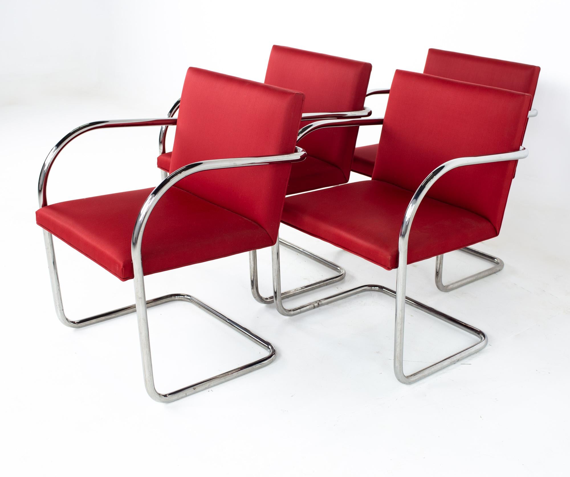 Mies Van Der Rohe for Knoll BRNO mid century red cantilever dining chairs - set of 4.
Each chair measures: 22 wide x 19 deep x 32 high, with a seat height of 17.5 inches and arm height of 26 inches

All pieces of furniture can be had in what we