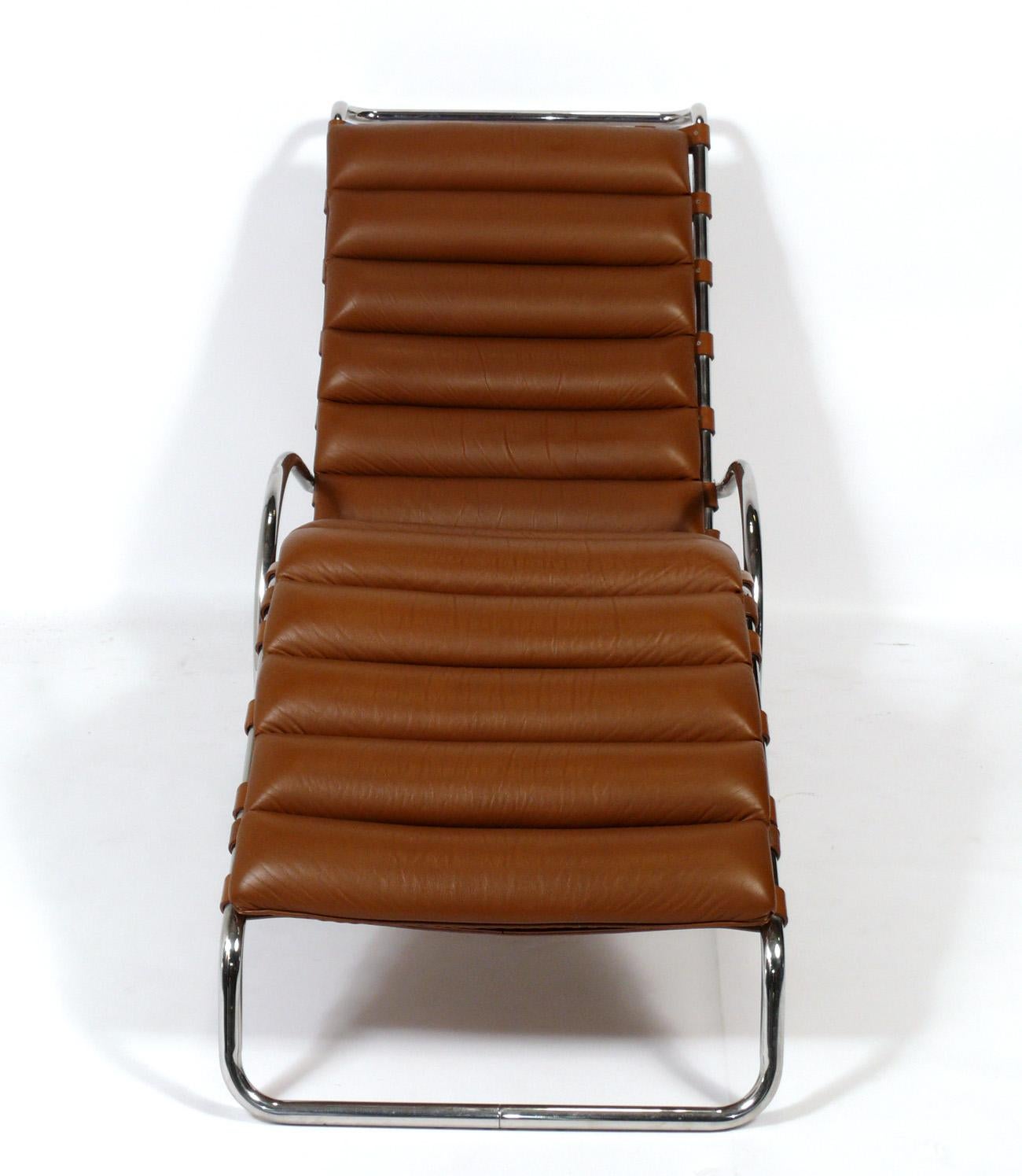 Sculptural mid century chaise lounge, designed by Ludwig Mies van der Rohe for Knoll, American, circa 1980s. It retains it's original caramel leather upholstery, which is perfectly broken in. The leather has been cleaned and conditioned and the
