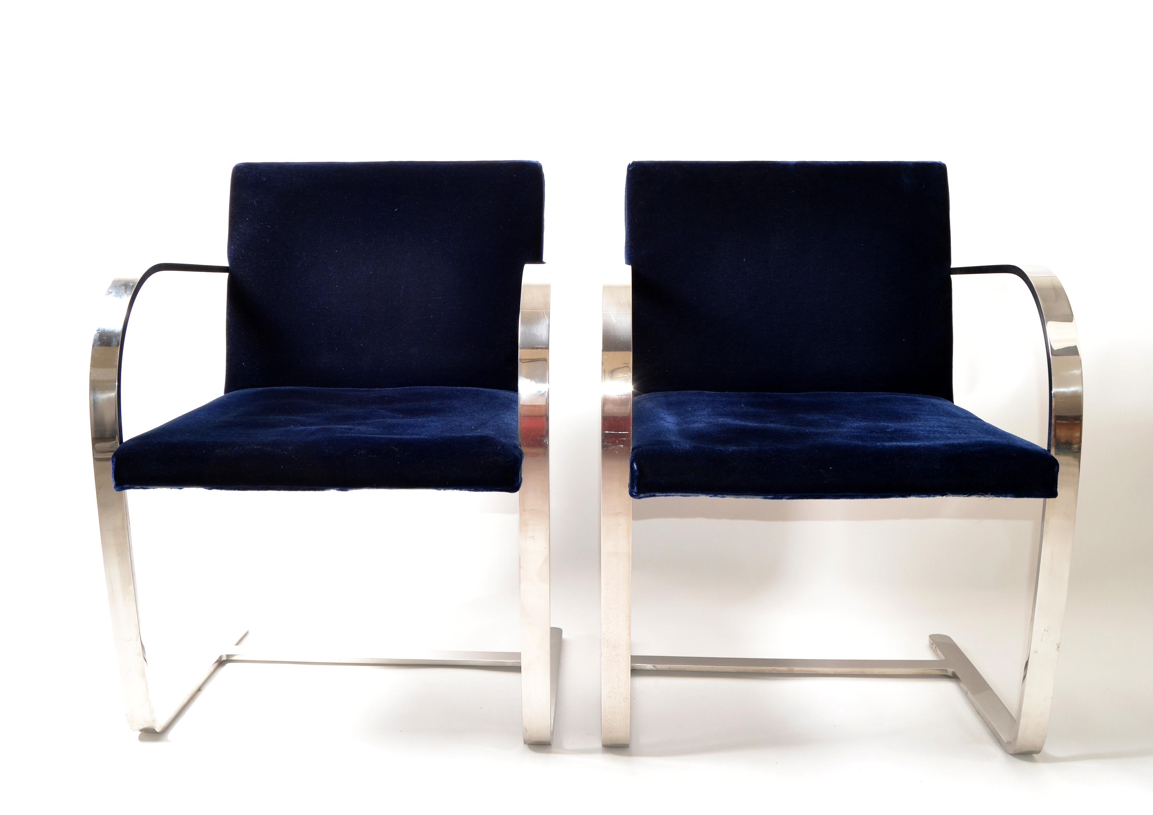 Pair of Mid-Century Modern Mies van der Rohe flatbar Brno for Knoll in stainless steel with the original navy blue velvet Fabric.
In very good condition marked with label, Knoll International made in year 1977.
I also have a pair in dark red