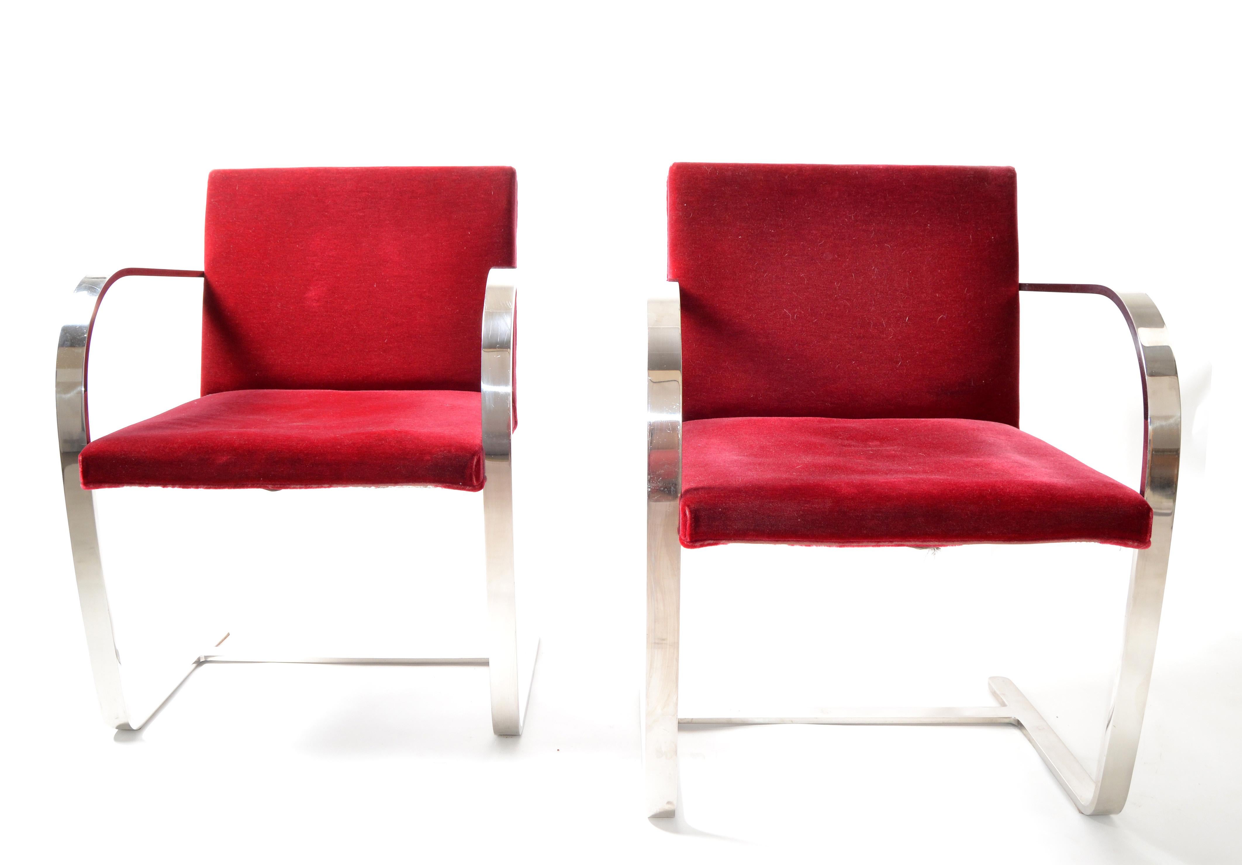 Pair of Mid-Century Modern Mies van der Rohe flatbar Brno for Knoll in stainless steel with the original dark red velvet Fabric.
In very good condition marked with label, Knoll International made in year October/25/ 1979.
Arm Height: 26 Inches.
 