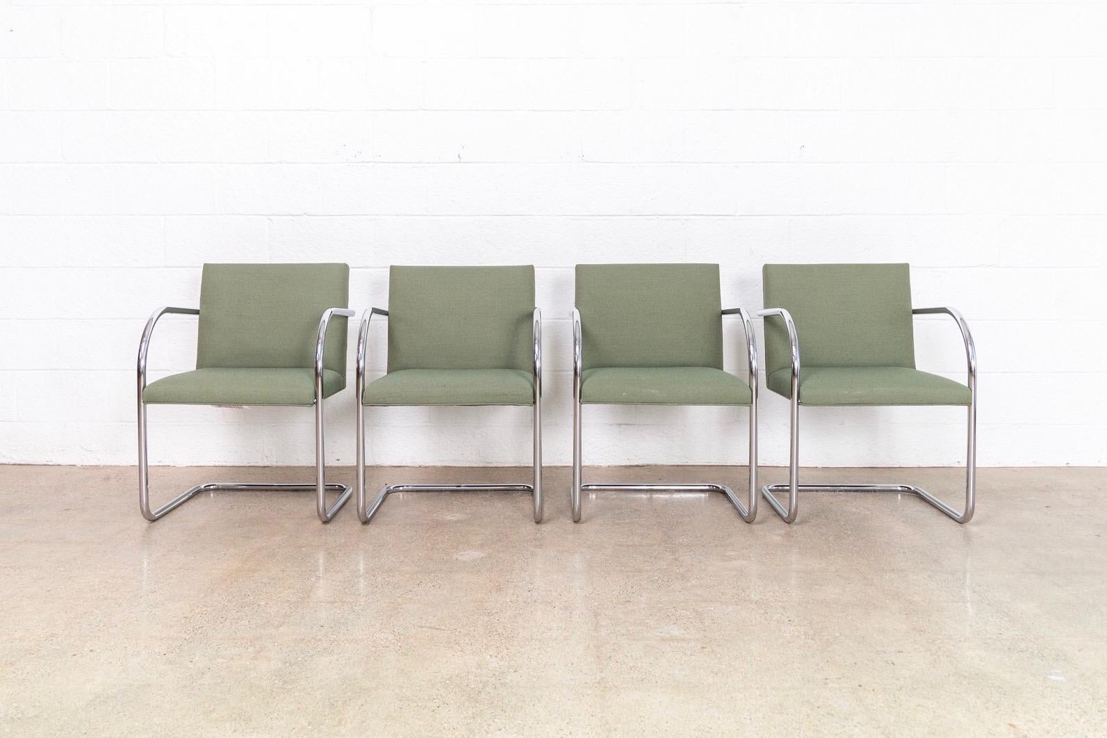 This set of four Mies van der Rohe Brno armchairs made by Gordon International are circa 1990. These iconic Mid-Century Modern chairs designed by Mies van der Rohe in 1930 feature clean lines and a simple profile. Model 504 has a cantilevered frame