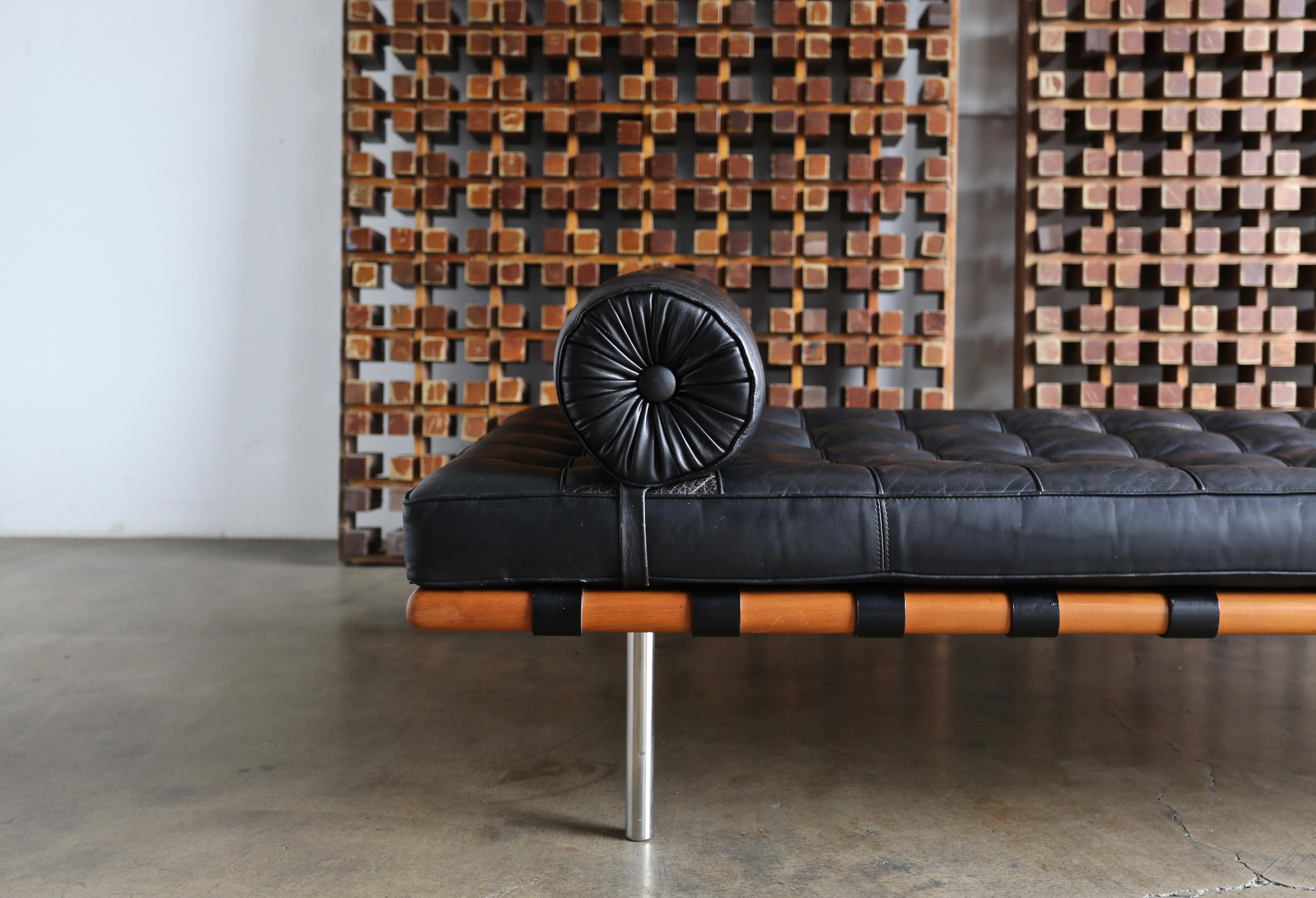 Black leather and walnut daybed by Mies van der Rohe for Knoll, 1983. This piece is in very good original condition with a beautiful patina to the original leather. Retains the original Knoll International tag to the cushion. Retains the original