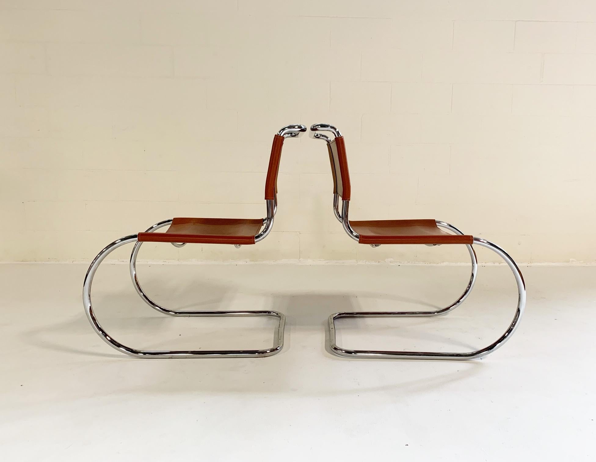 Icon. The MR chair designed by Mies van der Rohe is an instantly recognizable design. We collected this pair of MR chairs at auction. They are in excellent vintage condition. The caramel leather is in great shape.