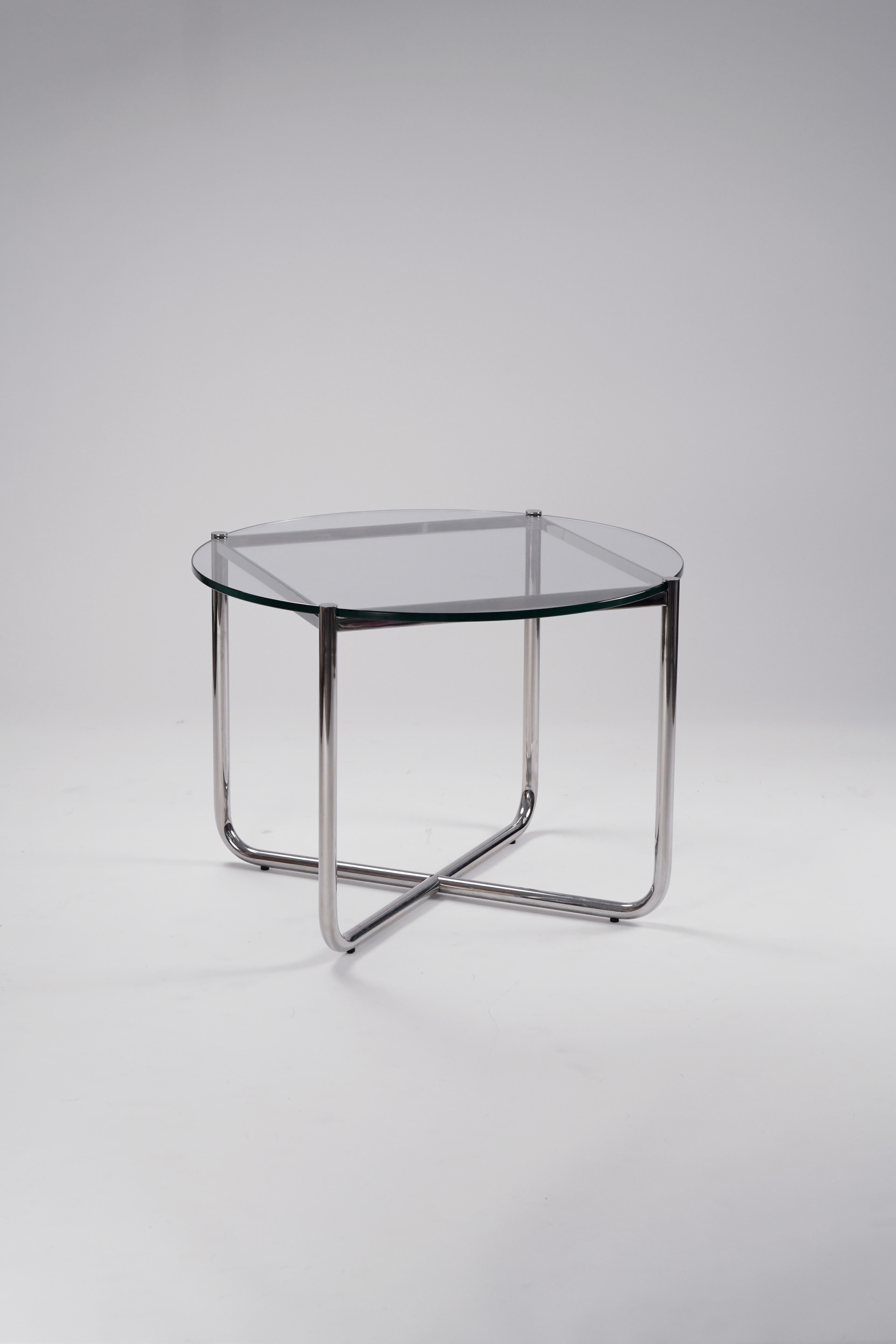 Beautiful MR side table by Mies Van der Rohe for Knoll. We believe these were produced sometime in the 80s or 90s. They are in good vintage condition with some minor pitting to the chrome bases and a couple small superficial scratches on the glass