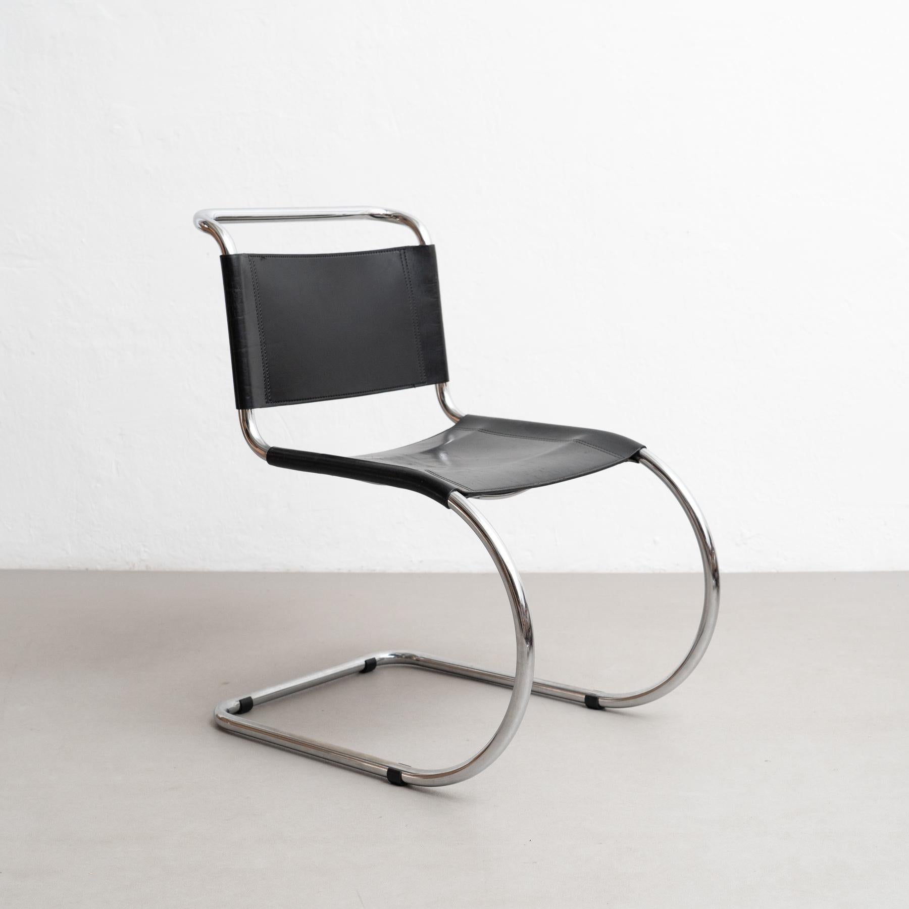Embrace the refined simplicity of modern architecture with this stunning MR10 cantilever chair, designed by the renowned Ludwig Mies van der Rohe circa 1930 and crafted by an unknown manufacturer in Germany around 1960. Inspired by Marcel Breuer's