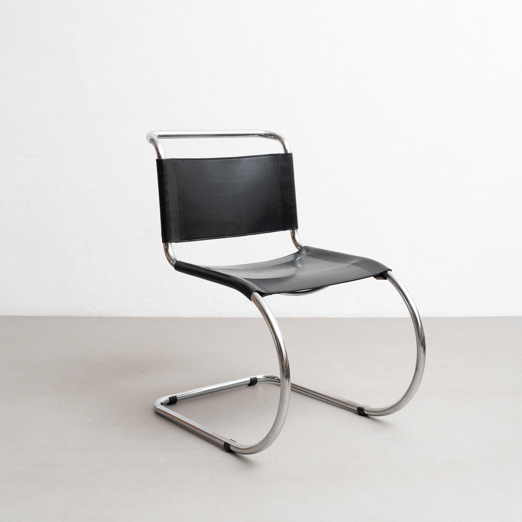 Embrace the refined simplicity of modern architecture with this stunning MR10 cantilever chair, designed by the renowned Ludwig Mies van der Rohe circa 1930 and crafted by an unknown manufacturer in Germany around 1960. Inspired by Marcel Breuer's