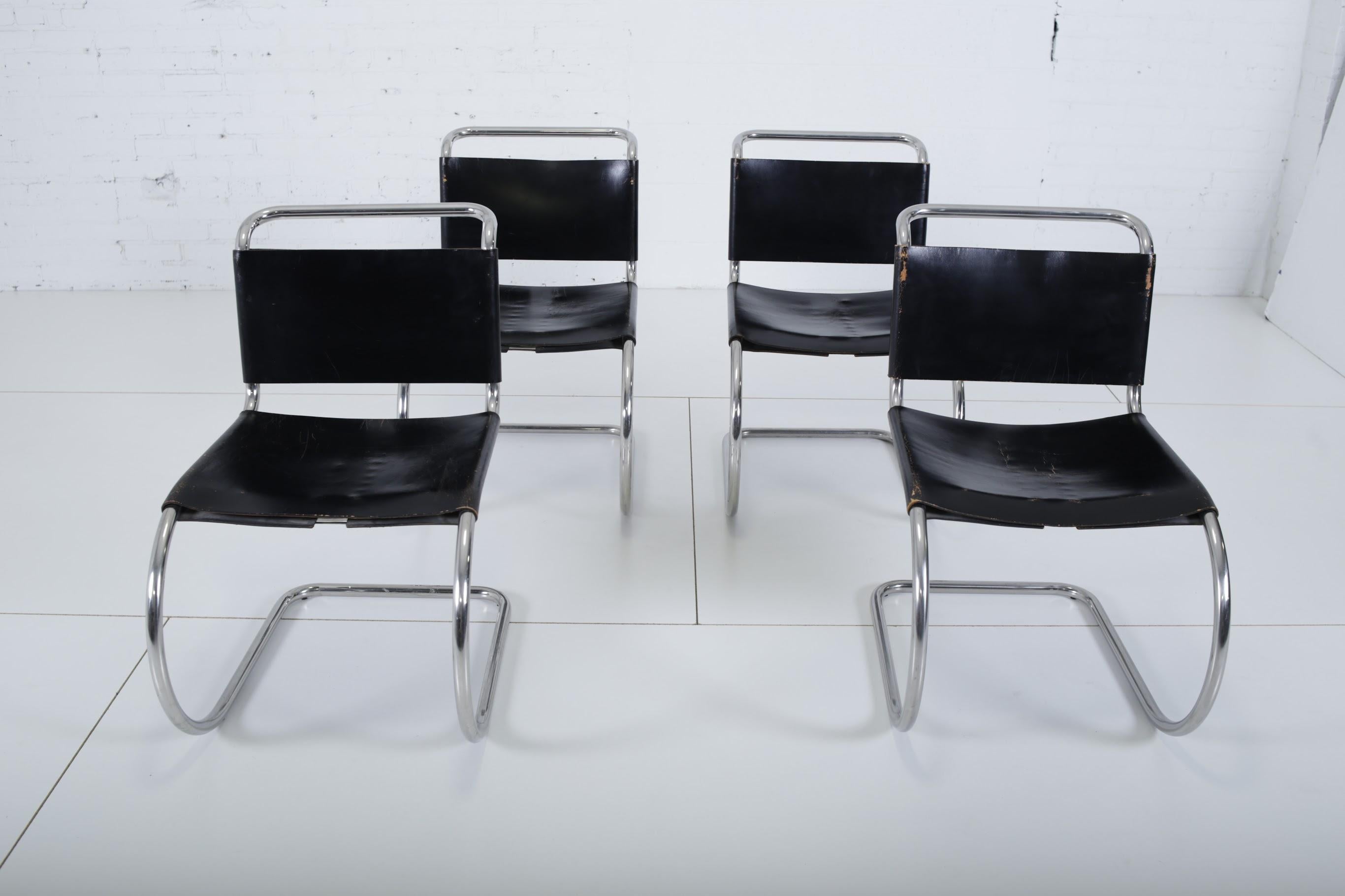 Set of 4 original 1960s MR10 dining chairs designed by Mies van der Rohe for Knoll. Original leather and stainless steel frames are in great shape. Chairs have early Knoll labels.

 