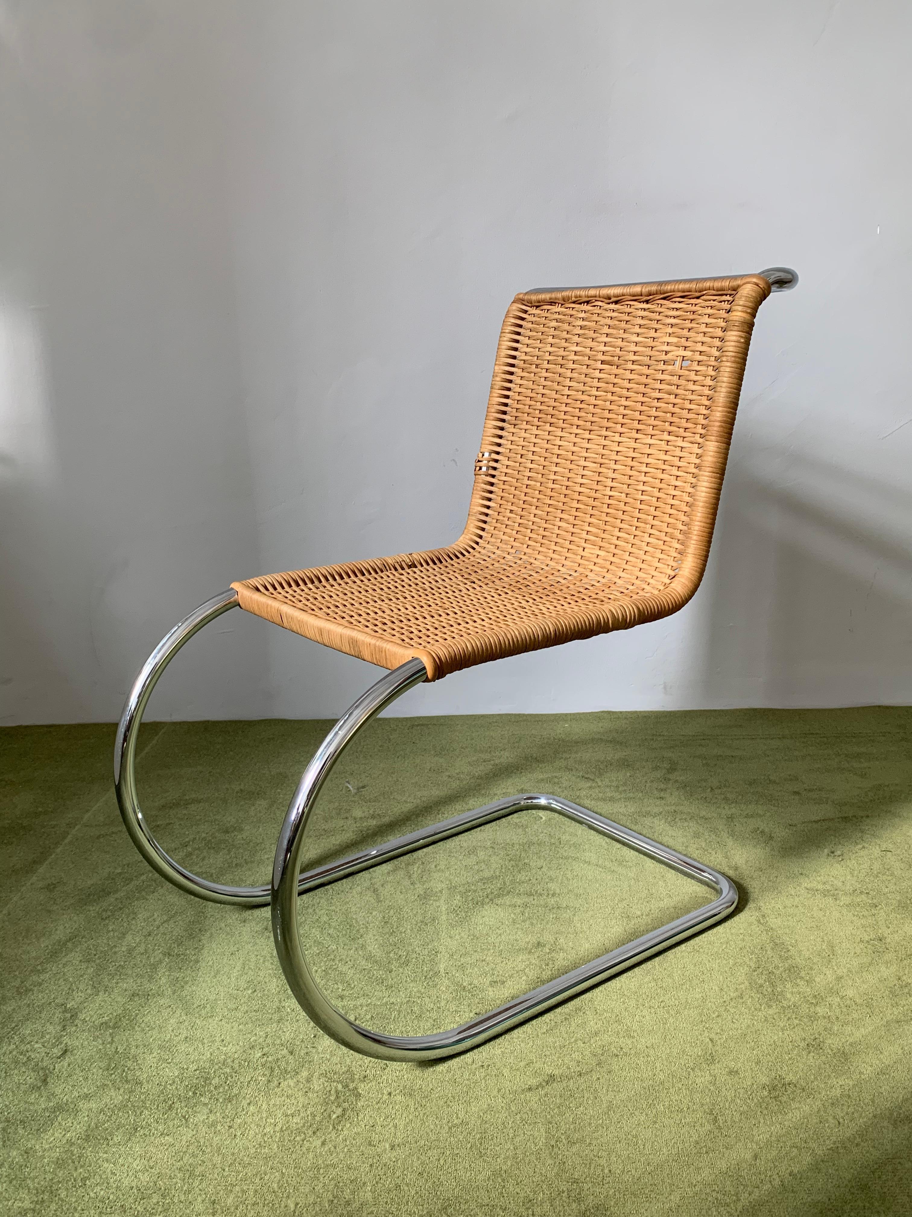 First designed in 1927, this chair’s deceptively simple design embodies the “less is more” philosophy of Mies van der Rohe. The modern chrome finish sharply contrasts with the natural woven-cane seat and back, creating a streamlined