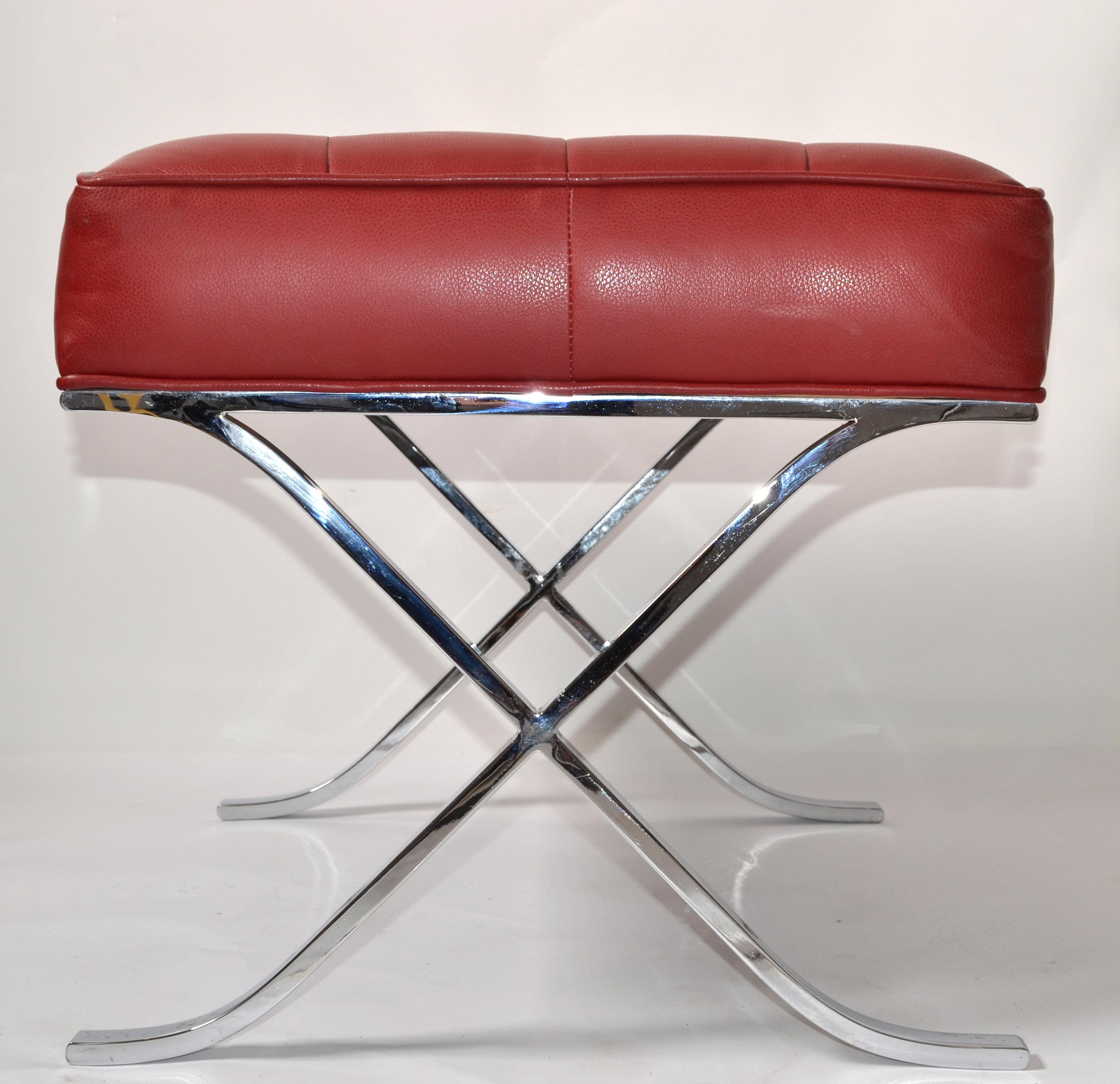 Mid-Century Modern Mies van der Rohe attributed steel X base Barcelona style ottoman in tufted rust red vinyl upholstery.
This Footstool is almost like the authentic Barcelona Series Ottoman which were original produced by Knoll.
The dark red