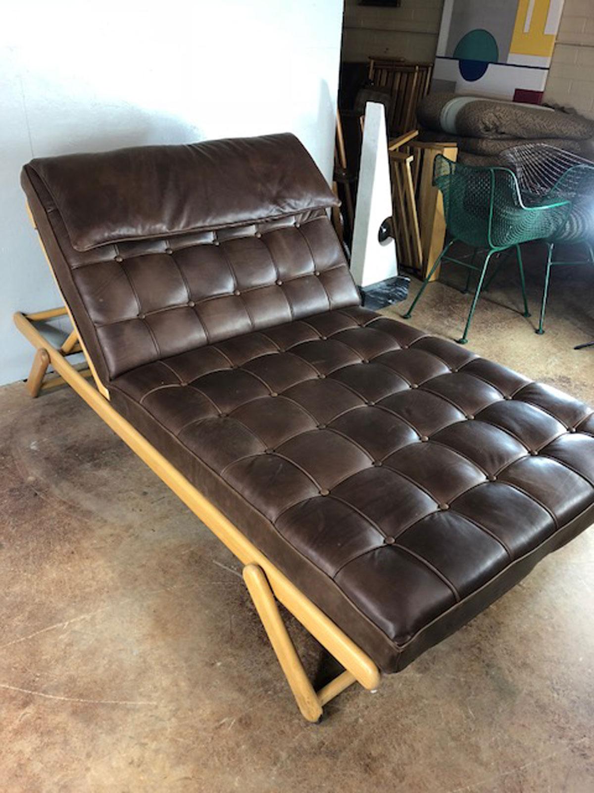Unique double-wide leather and multi-position lounge chair and / or daybed. Frame is very well built and heavy. Made to last. New antique brown weathered style leather. Have never seen these units before. We have a pair, circa 1960s.