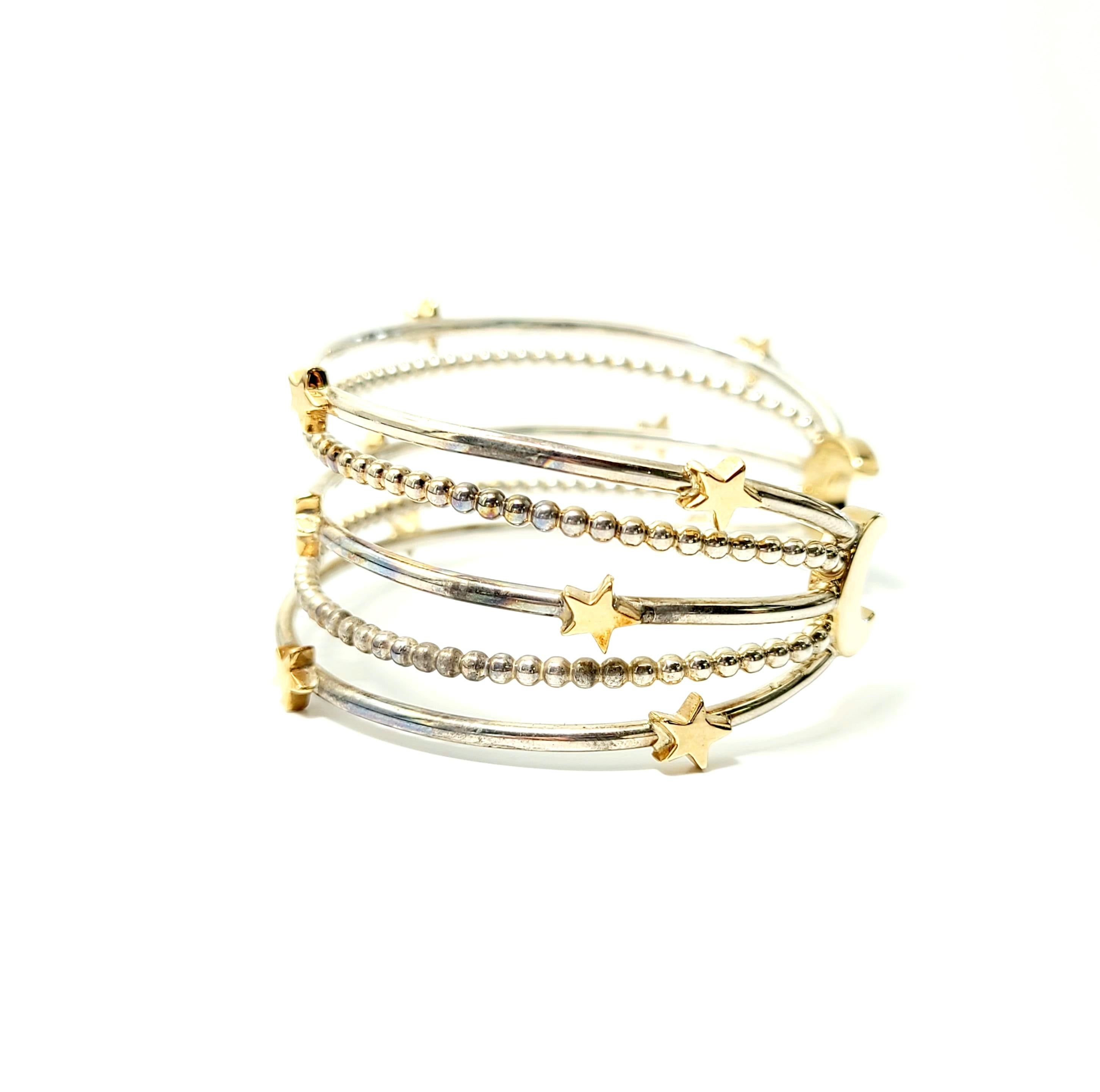 Sterling silver and 14K yellow gold Crescent moon and stars cuff bracelet by Mignon Faget,

Mignon Faget is well known and highly sought after. This piece is part of the Crescent Collection which draws inspiration from the New Orleans water tower