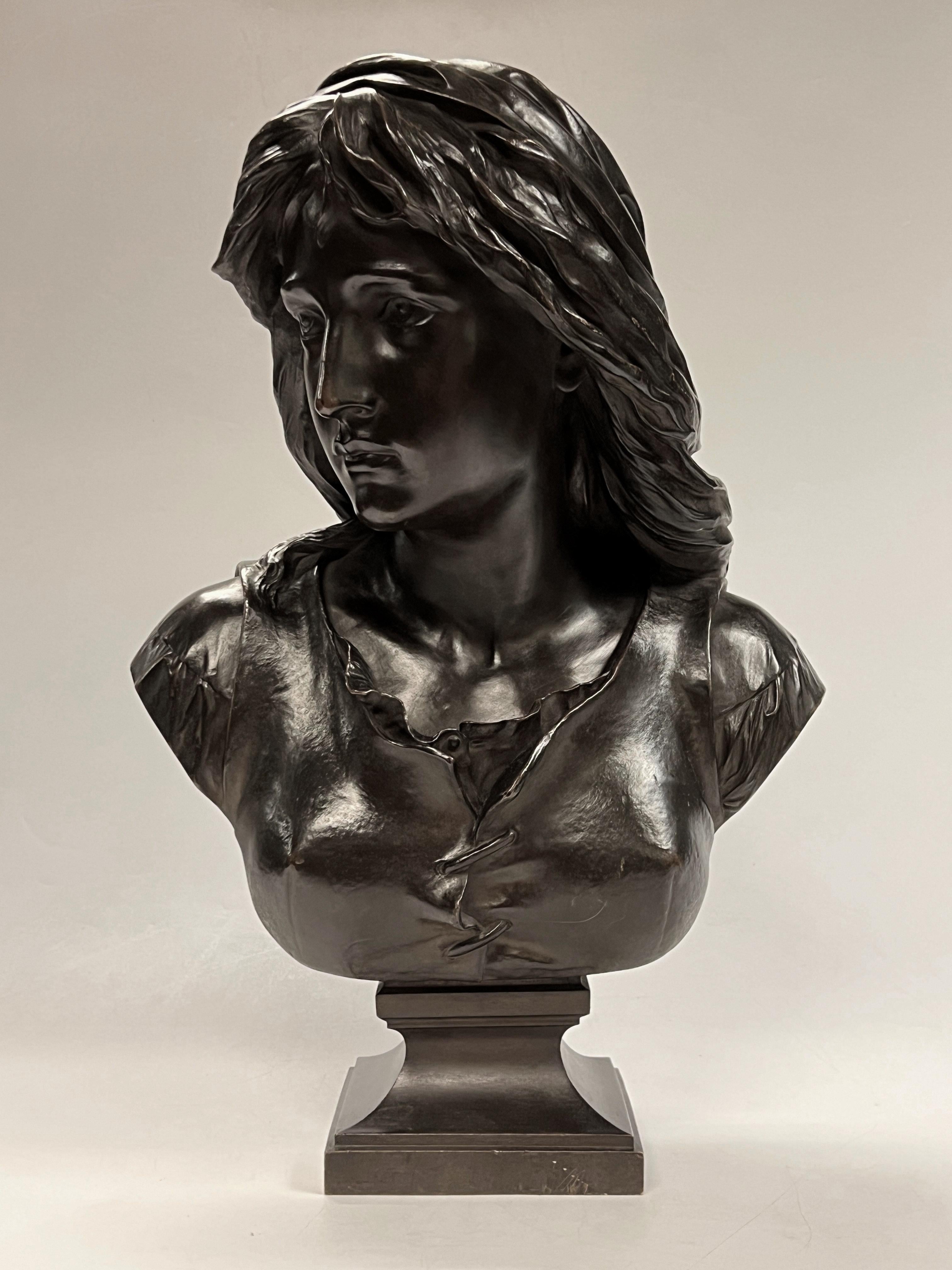 Busto antico (fine XIX secolo) in bronzo patinato di Mignon secondo il modello originale di Eugène Antoine Aizelin (1821-1902).  22 per 14 per 11 pollici e in ottime condizioni.  Firmato EUG. AIZELIN.

Mignon è il personaggio principale dell'opera