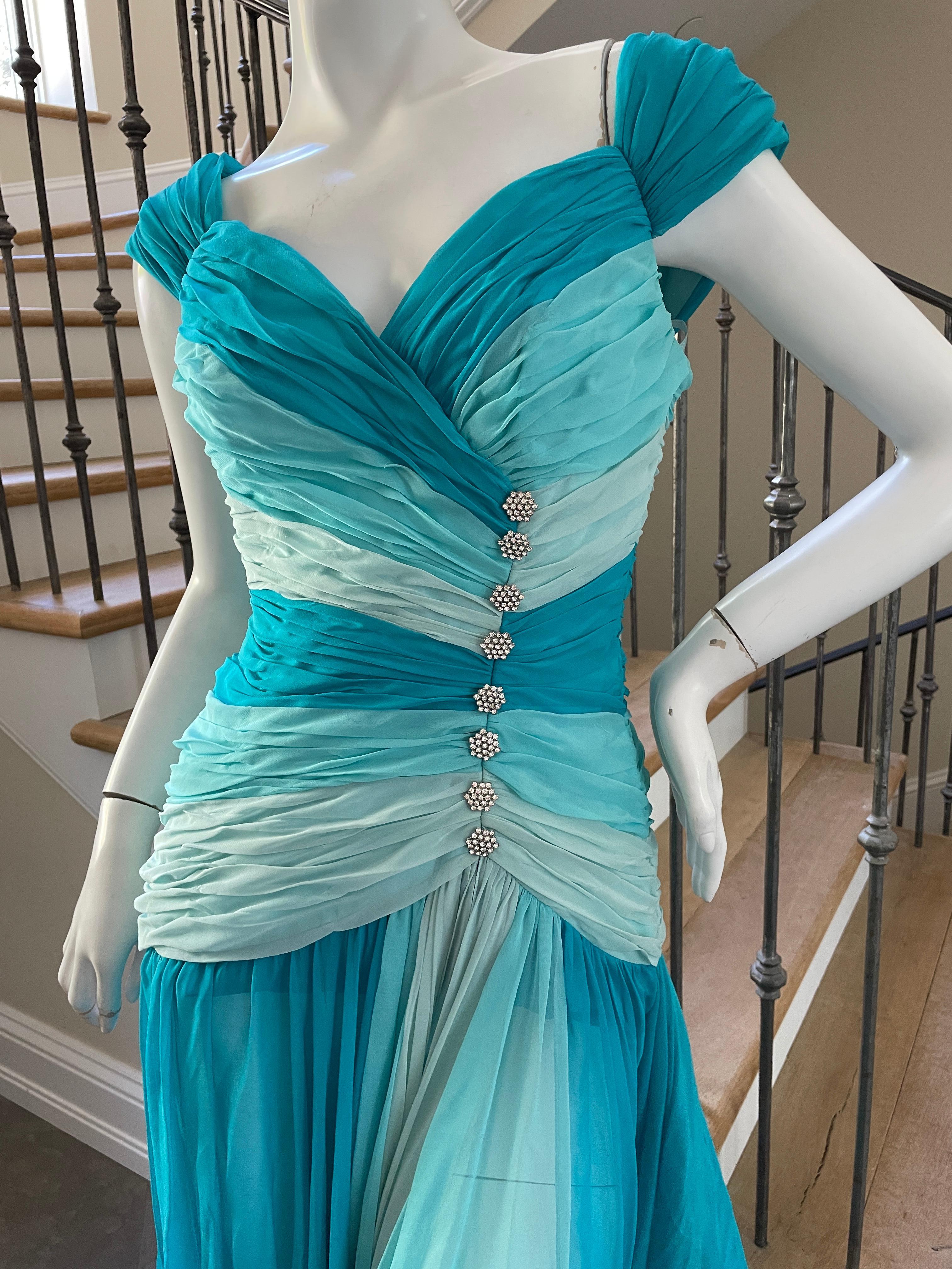 Mignon Vintage 1980's Ombre Blue Evening Dress with Rhinestone Crystal Buttons.
Mignon was a designer brand in the 60's, 70's and 80's sold at Neiman Marcus, I Magnin and Saks Fifth Avenue.
So good, please use the zoom feature to see details.
 Size