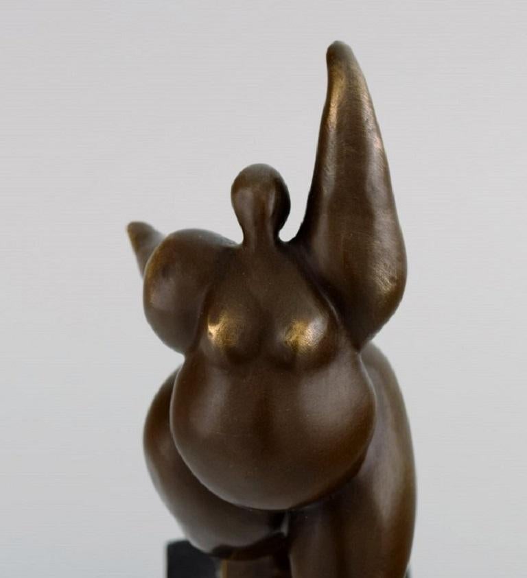 Miguel Fernando Lopez (Milo). Portuguese sculptor. 
Semi-abstract bronze sculpture of a nude woman on a marble base. Late 20th century.
Measures: 27.5 x 10 cm.
In excellent condition.
Stamped.