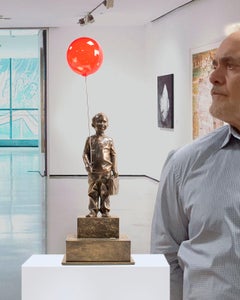 Boy with red magic balloon 47 - Miguel Guía  Realist Bronze layer Sculpture