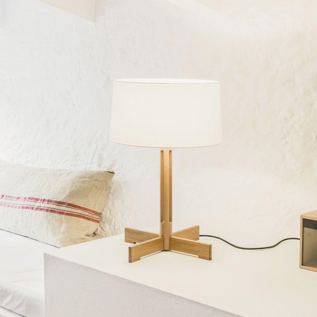 Miguel Milá 'FAD' table lamp in natural oak and white linen for Santa & Cole

Founded in 1985 in Barcelona, Santa & Cole produces iconic pieces by such luminaries as llmari Tapiovaara, Miguel Milá and other European icons with a commitment to