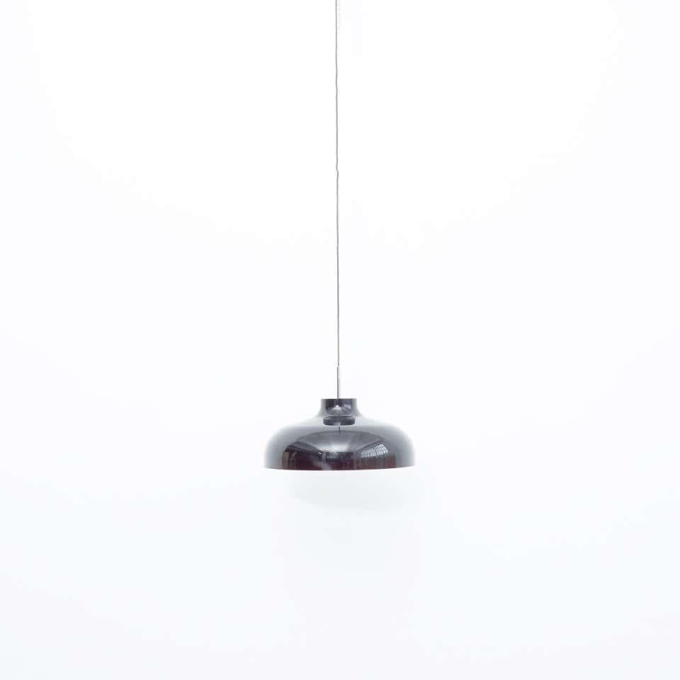 Ceiling lamp designed by Miguel Milà.
By unknown manufacturer, circa 1970.

In good original condition, preserving a beautiful patina, with minor wear consistent with age and use. 

Materials:
Metal

Dimensions:
Ø 47.5 cm x H 30 cm.