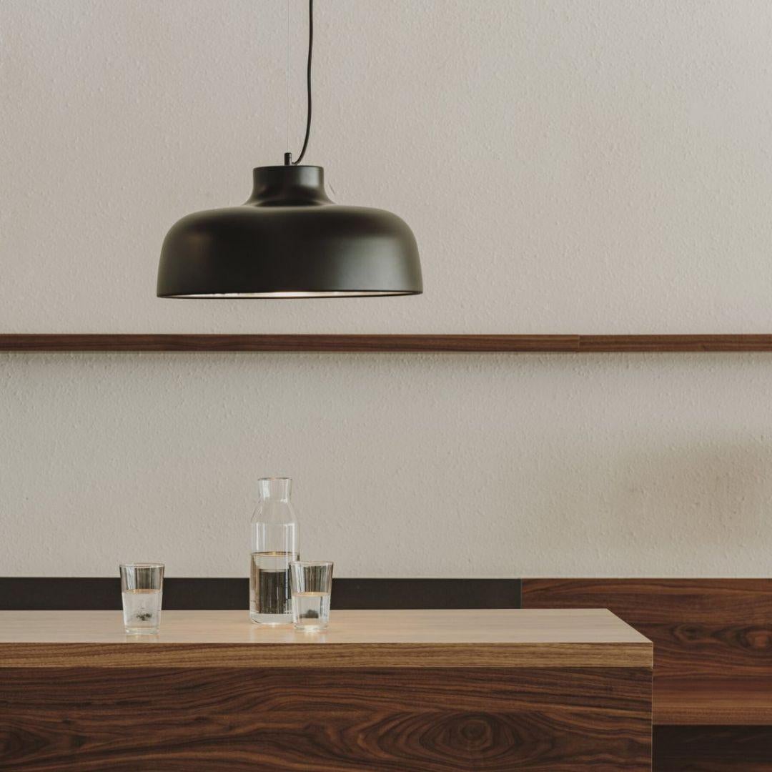 Miguel Milá 'M68' pendant lamp in black aluminum for Santa & Cole

Founded in 1985 in Barcelona, Santa & Cole produces iconic pieces by such luminaries as llmari Tapiovaara, Miguel Milá and other European icons with a commitment to faithfully