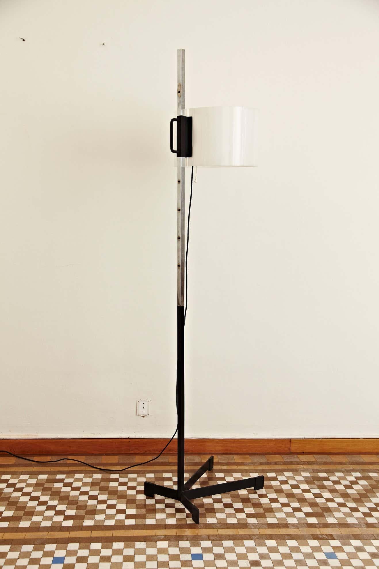 Floor lamp designed by Miguel Mila´, circa 1950.
Manufactured by Tramo (Spain), circa 1950.

Signed with serial number 20.

In good original condition, with minor wear consistent with age and use, preserving a beautiful patina.

Miguel Mila´