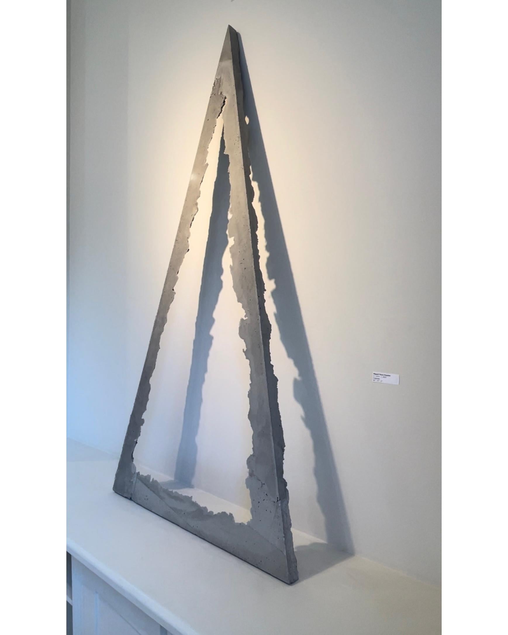 Contemporary Abstract Triangular Sculpture 

C /1024\ 1
64”, 32”, 2” :: CONCRETE :: 2022

About The Artist
Miguel A Otero Fuentes is a Puerto Rico-born USA migrant, a university trained architect specializing in facade design, and a self-taught