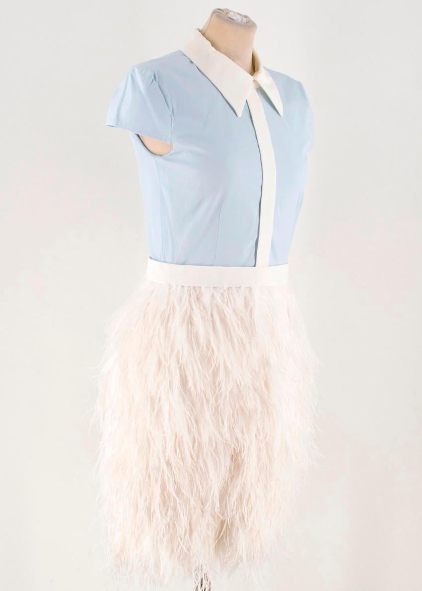 Mihano Momosa Blue and White Feather Dress

-Blue and white dress 
-White ostrich feather skirt
-Back zip closure
-White trim and collar
-Short sleeves

Please note, these items are pre-owned and may show signs of being stored even when unworn and