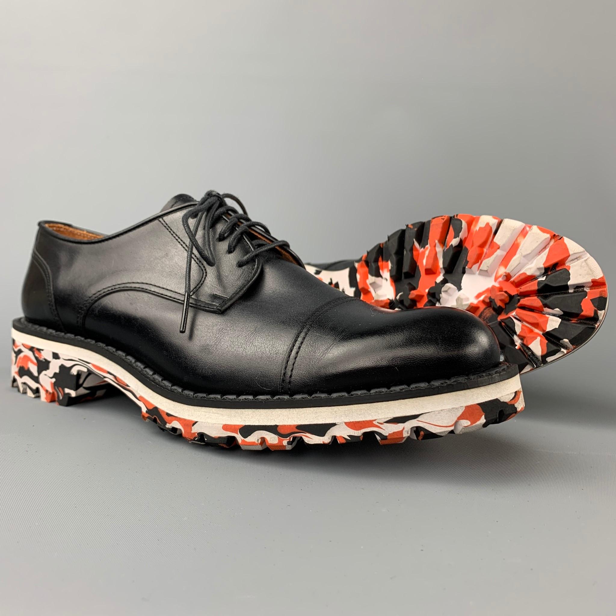 MIHARAYASUHIRO shoes comes in a black leather featuring a cap toe, multi-color vibram sole, and a lace up closure. 

Excellent Pre-Owned Condition.
Marked: 8425-0300 25

Outsole:

11 in. x 4 in. 