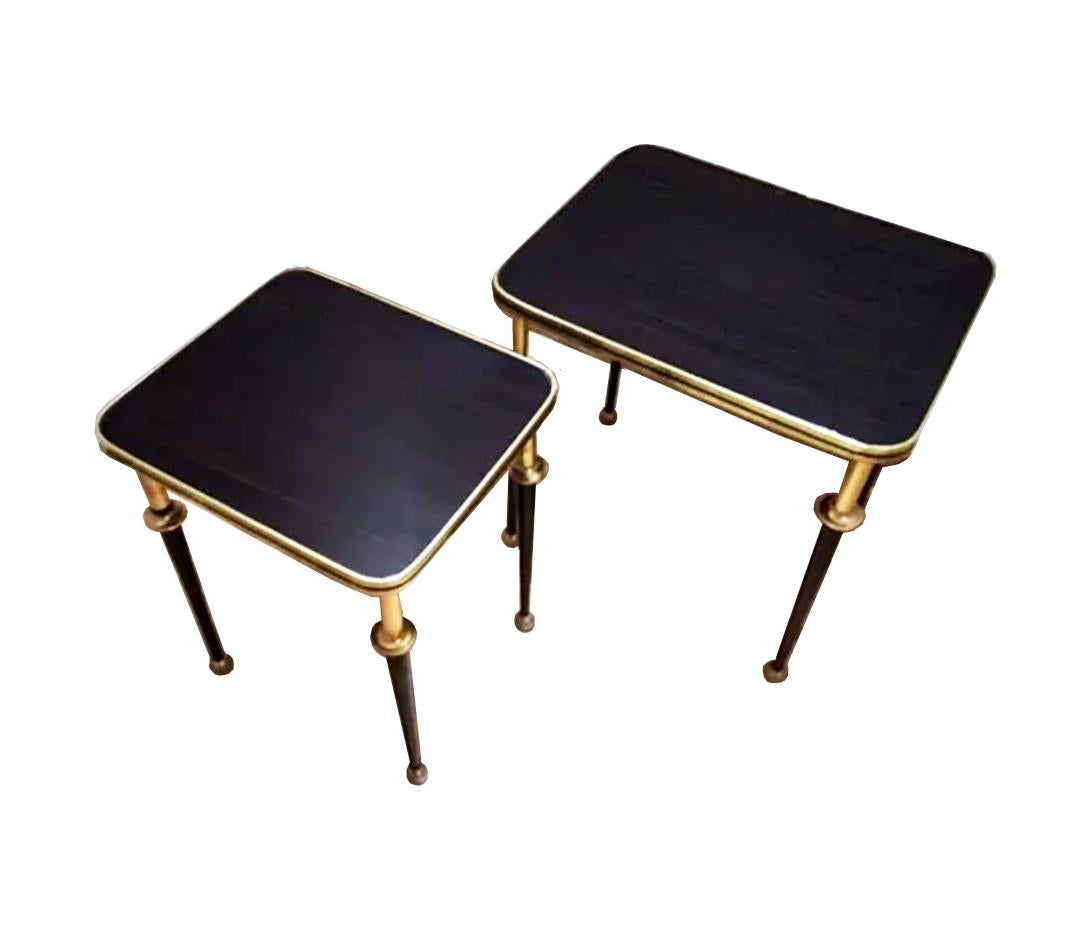 Midcentury nesting tables

Measures: Large coffee table: 45'5 cm x 35'5 cm x 47 cm high.

Small table: 35'5 cm x 30'5 cm x 44'5 cm high.