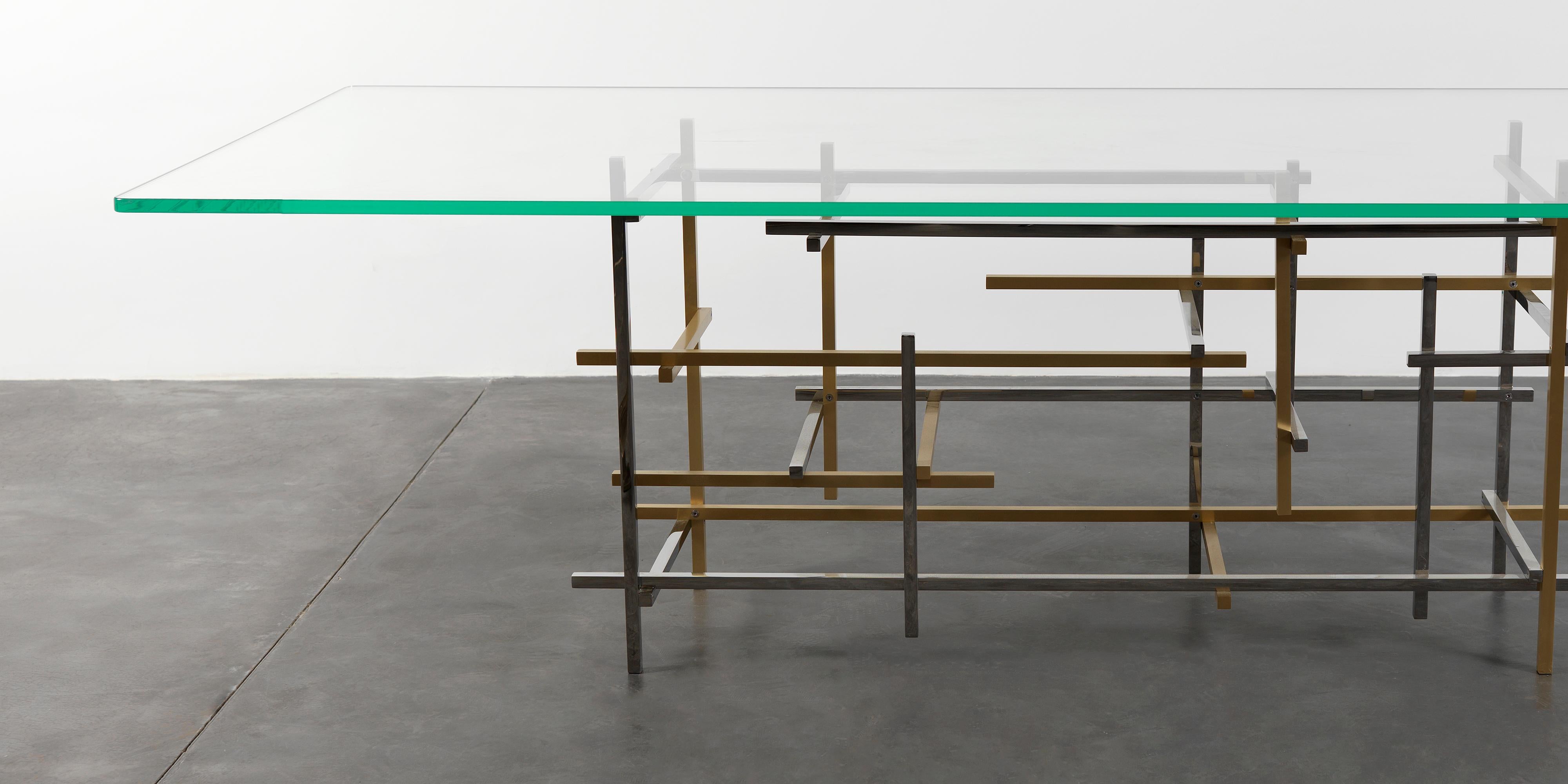 The lustrous dining table of the Mikado line, portraying a dynamic base with a transparent top.
By Georges Amatoury Studio, 2012.