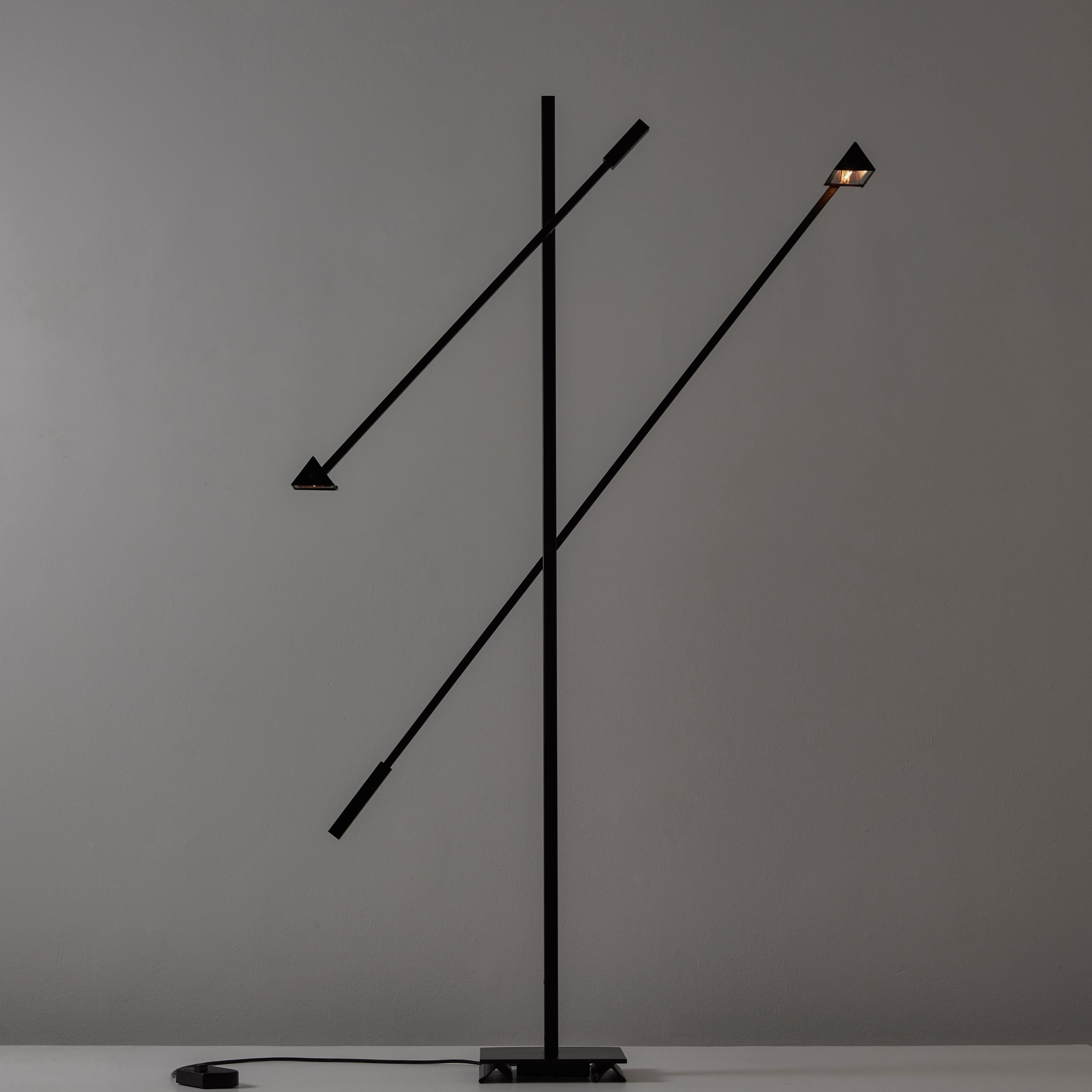 'Mikado' Floor Lamp by Michel Senne for Arlumiere. Designed and manufactured in France, circa the 1970s. A dual armed floor lamp with two traingular shades, all pivotable in arm postioning and shade direction. Both arms can be moved on a parallel