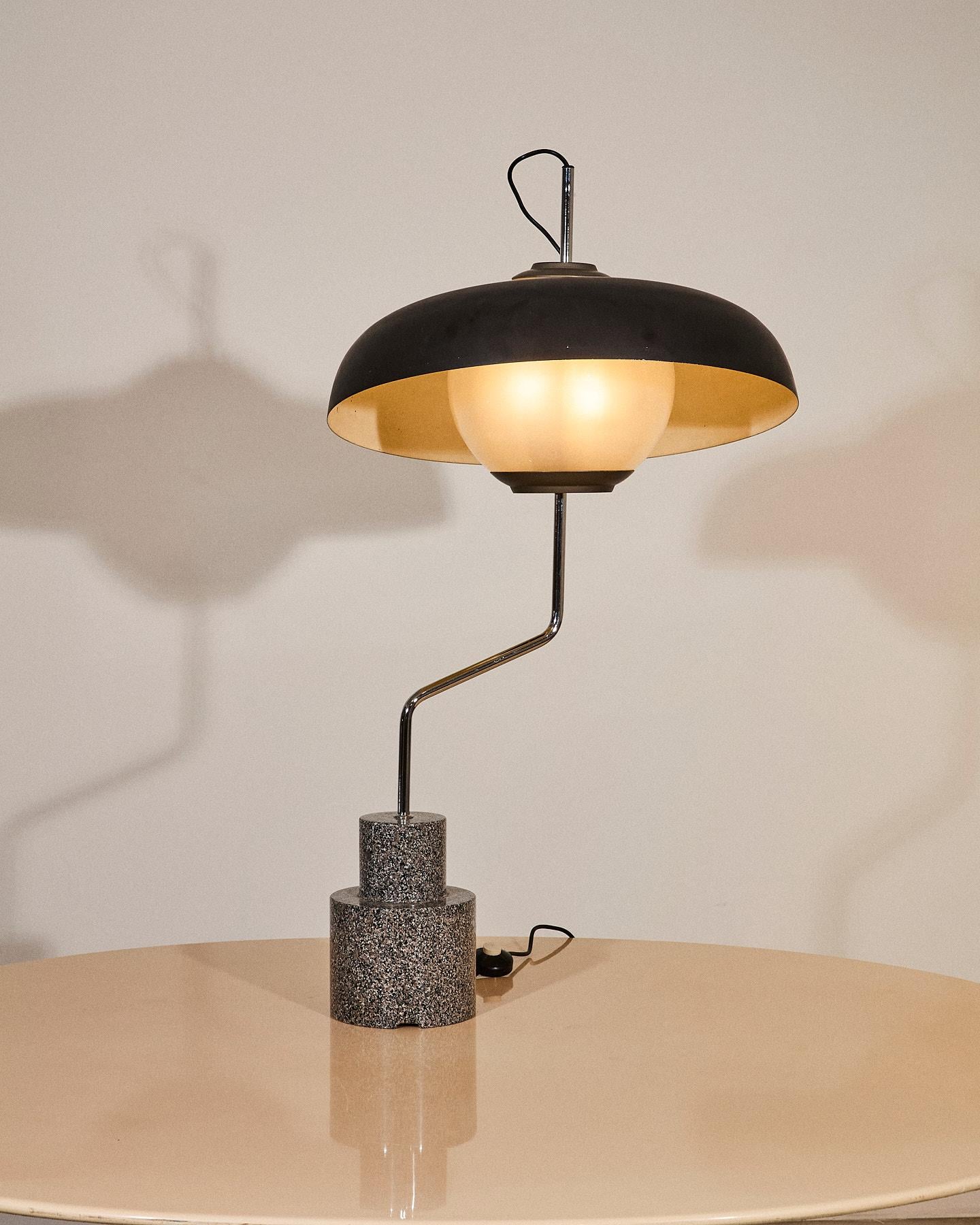LTA5, also known as Mikado, is a rare and  large table or floor lamp with a heave granite base and adjustable height glass diffuser and adjustable aluminum shade. Designed in 1960 by Luigi Caccia Dominioni and manufactured by Azucena.