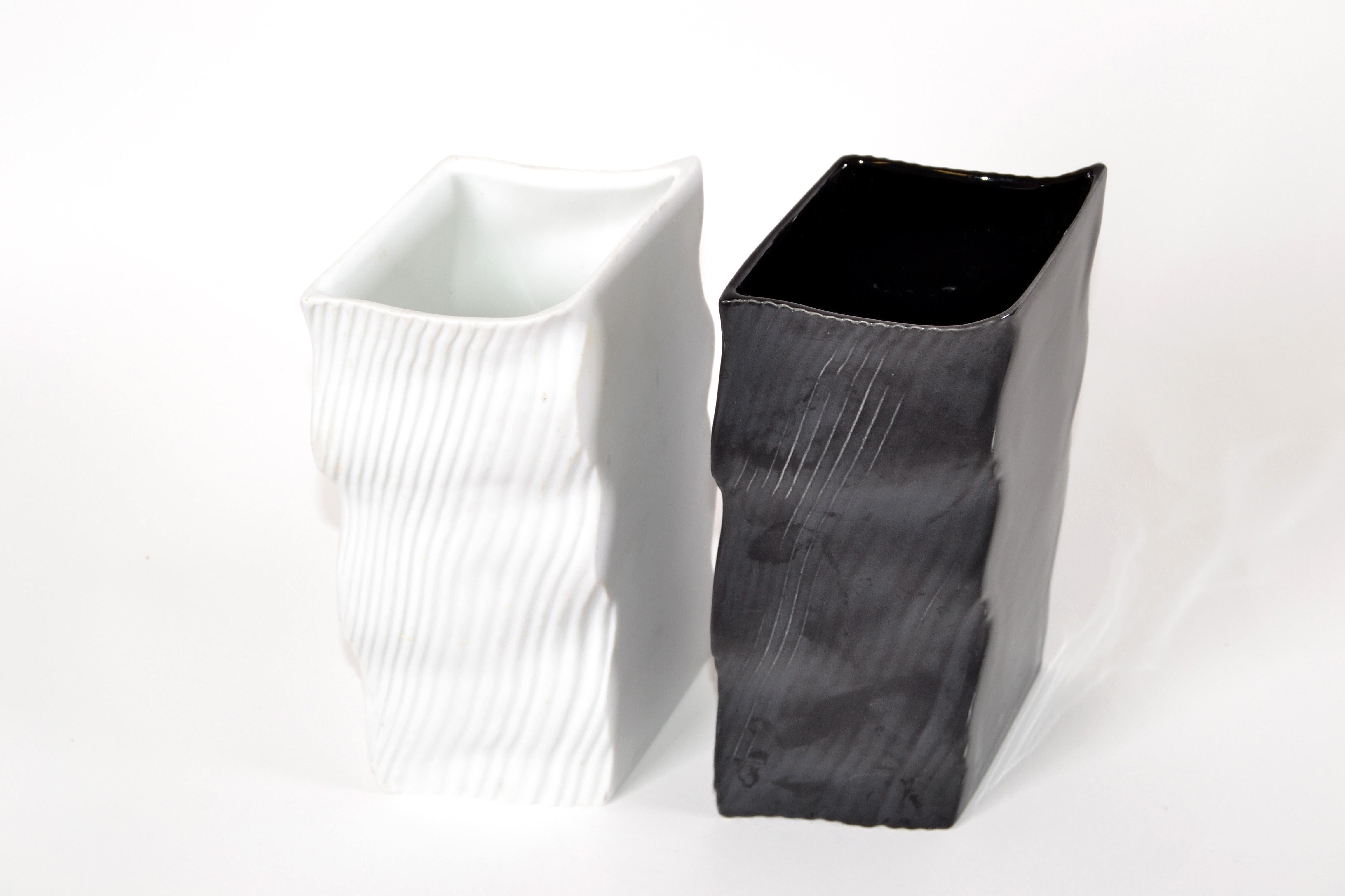 Set of 2 Mikasa Japan ceramic black and white vases with wave design Mid-Century Modern.
Original label at the base.
