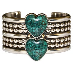 Bracciale in argento sterling con grandi cuori in turchese di Mike Bird-Romero, 1993