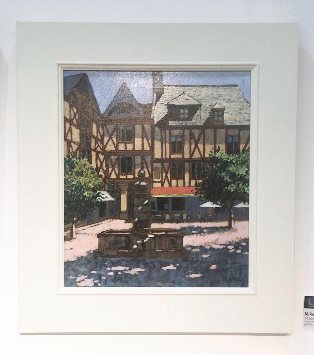 Shaded Square, Brittany - French sunny townscape fountain acrylic painting - Painting by Mike Hall