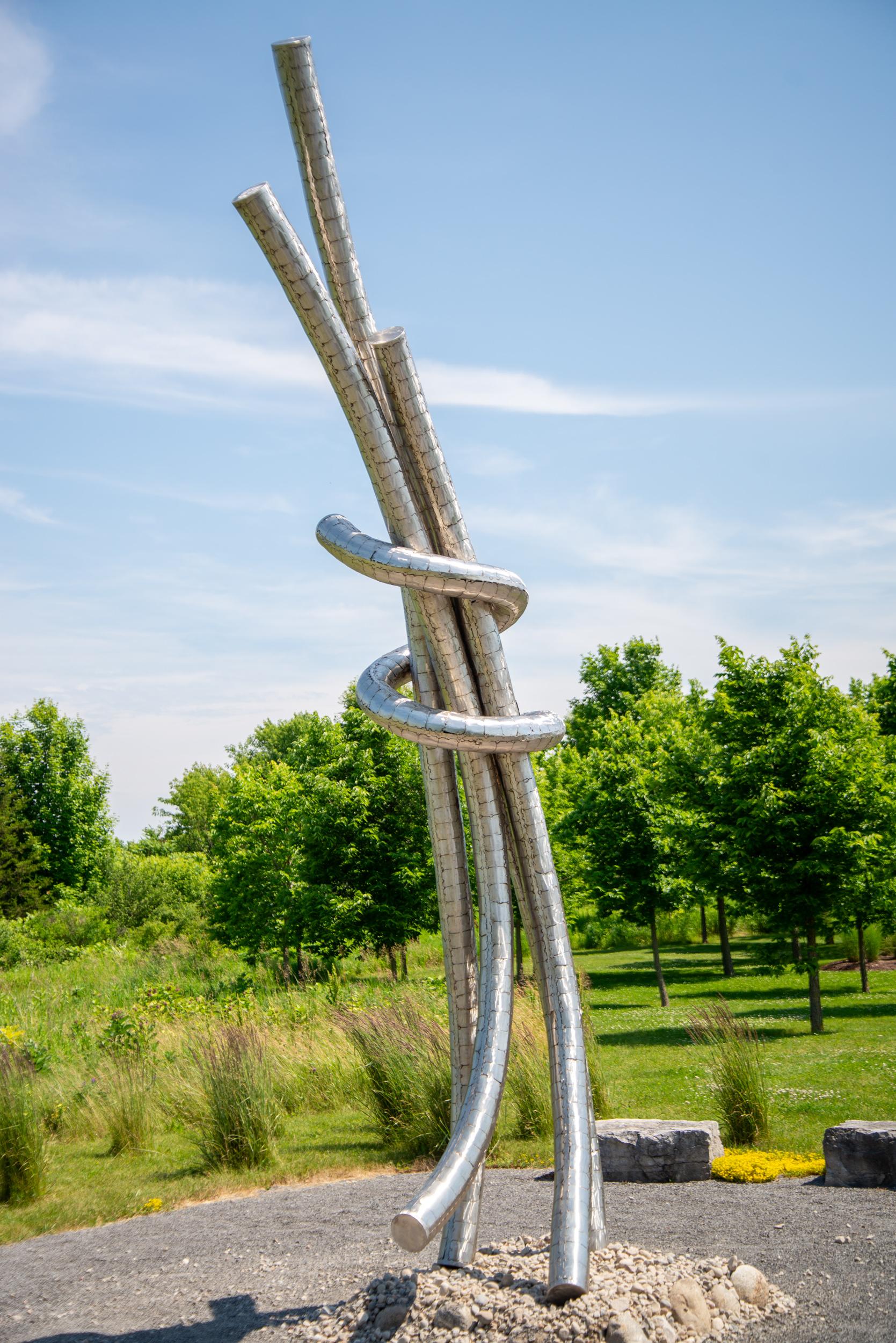 Collusion - tall, monumental, contemporary, abstract, stainless steel sculpture - Abstract Sculpture by Mike Hansel