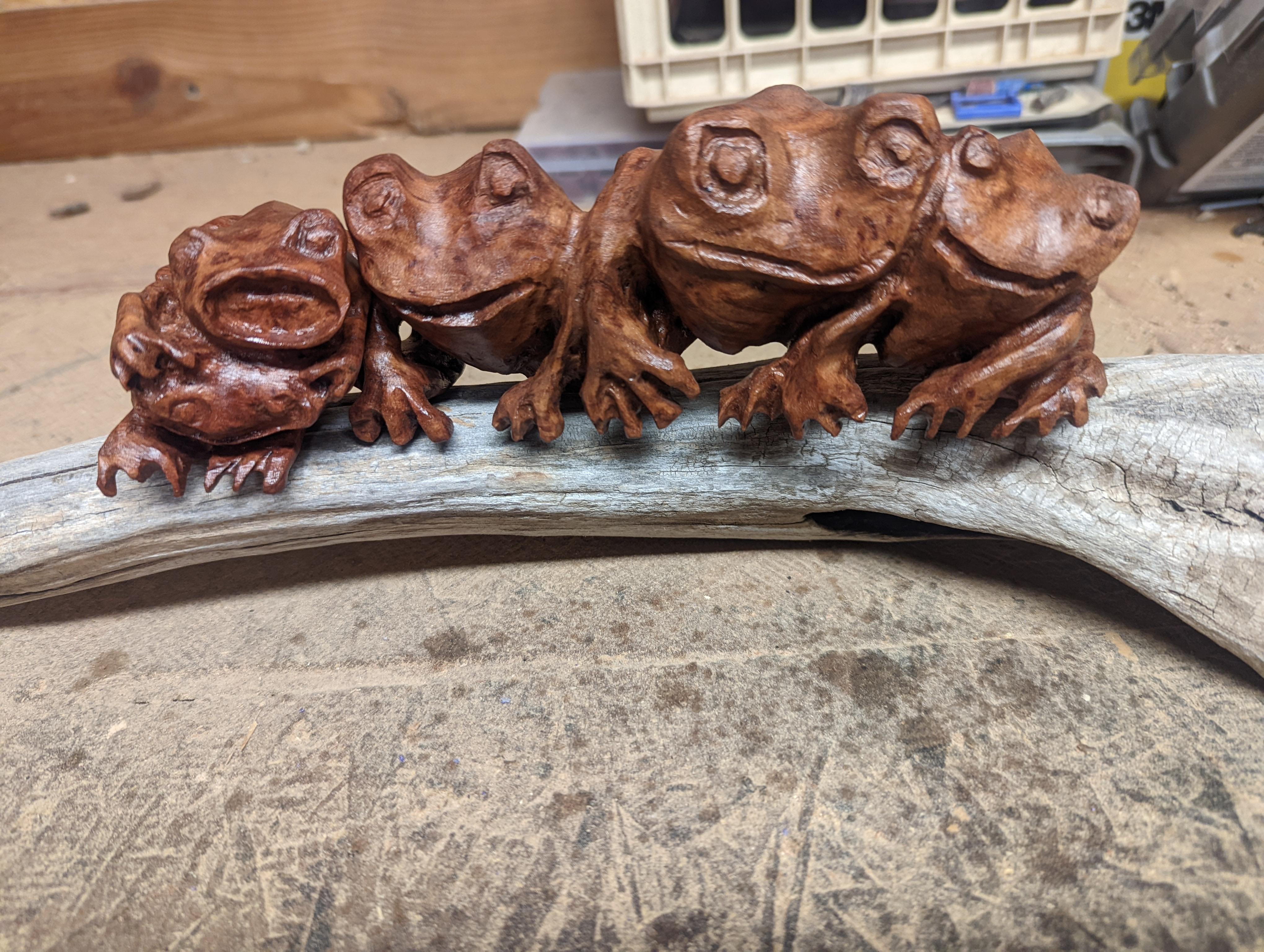 Frog singing on a log
2.0 x 5.0 x 10.0, 1.0 lbs 
Wood 
Hand signed by artist 

Artist's Commentary: 
