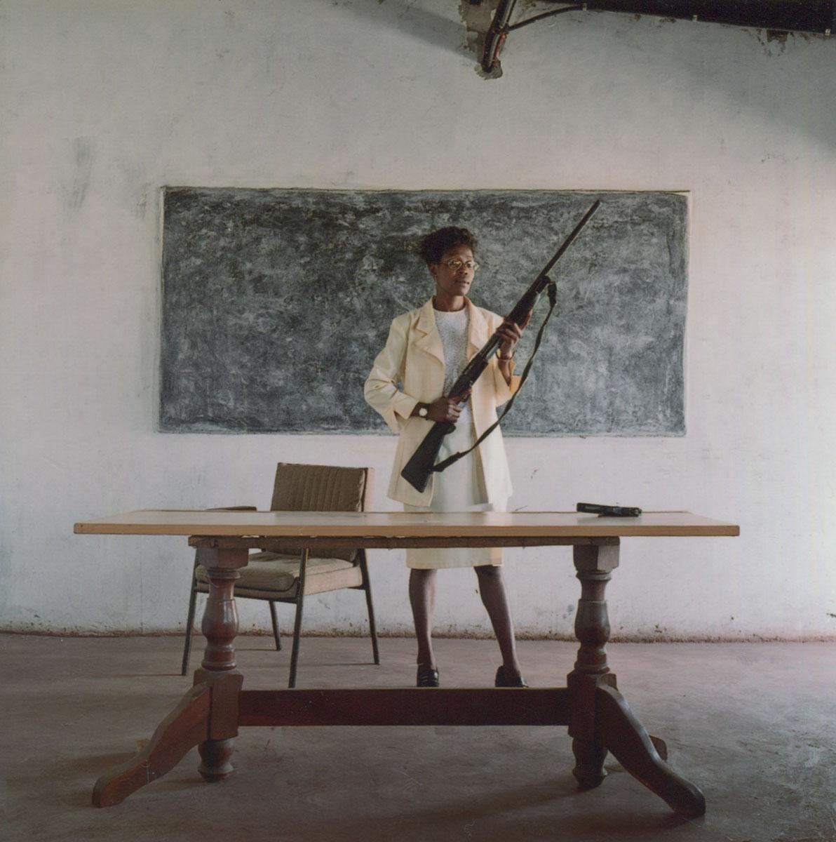 Mikhael Subotzky Portrait Photograph - Lindiwe Mutoma (female detective), Lusaka, Zambia, 2005