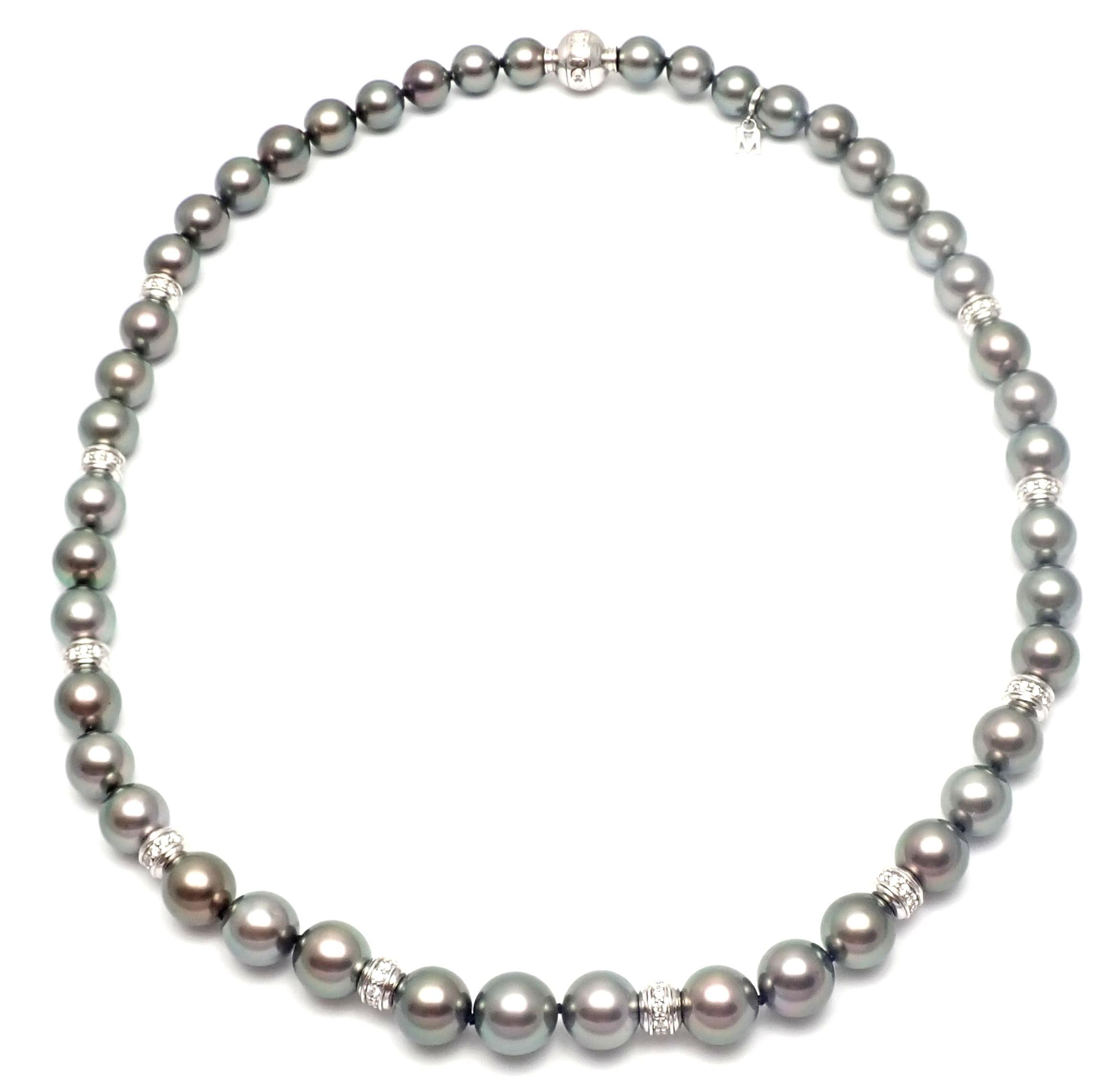 18k White Gold 10 Diamond Rondelles Tahitian Black South Sea Pearl Necklace by Mikimoto. 
With 10 diamond rondelles and 1 diamond in the lock
total weight approximately 2ct
45 Tahitian Black South Sea black pearls from 8mm to 10.5mm
This necklace