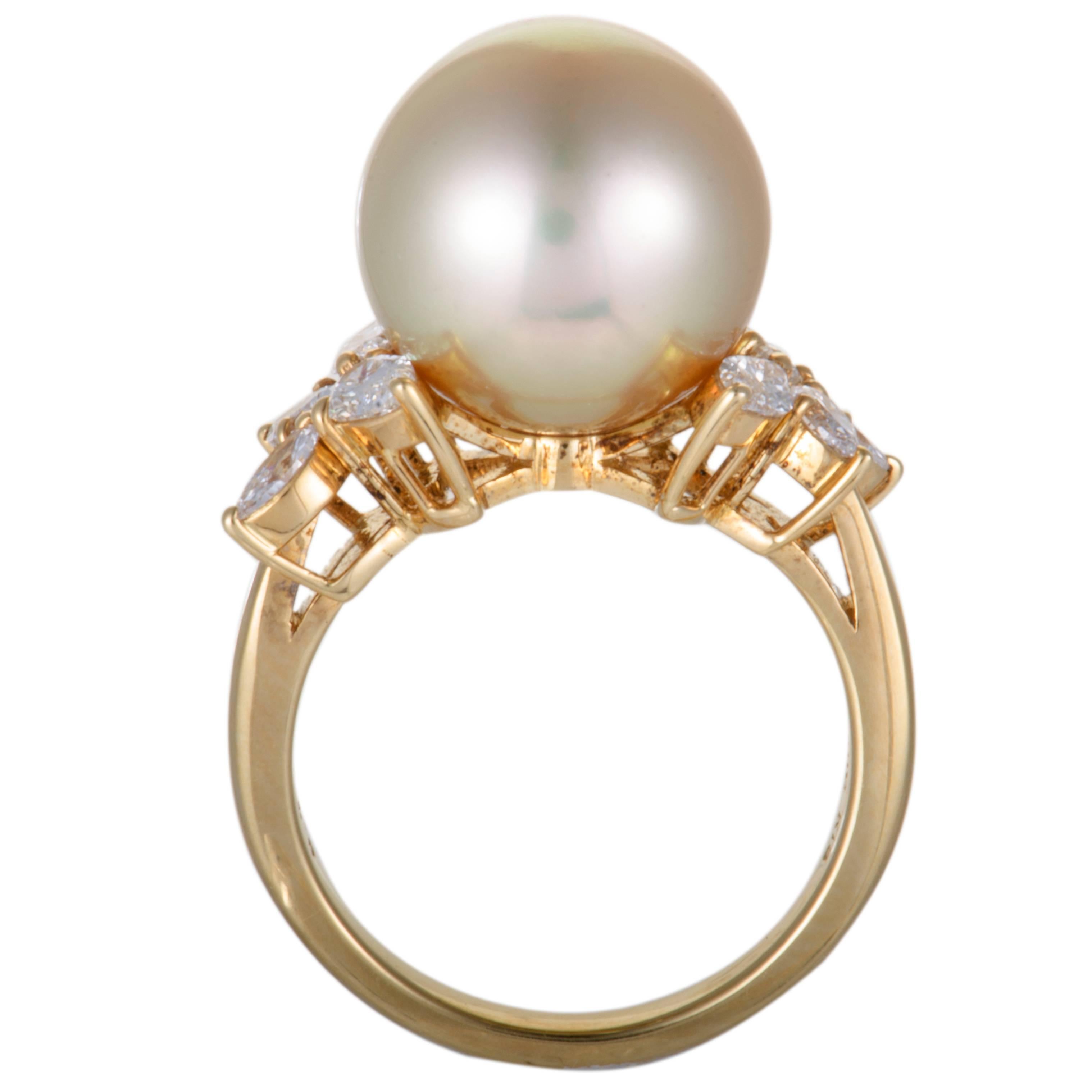 This stylish 18K yellow gold ring by Mikimoto boasts a sublime aesthetic effect in its artsy design. The ring's gracefully elegant design is accentuated by an adornment of 0.75ct of scintillating diamonds and a spectacular white pearl of 12.3