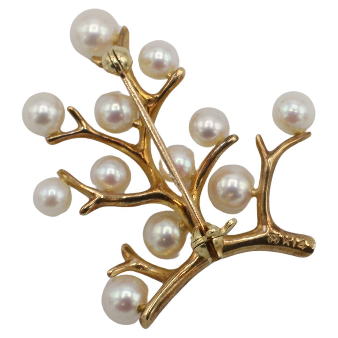 Mikimoto 14 Karat Yellow Gold Akoya Cultured Pearl Tree of Life Brooch Pin
Metal: 14k yellow gold
Weight: 5.89 grams
Pearls: 4 - 5.5mm
Dimensions: 30 x 35mm
Retail: $2,550 USD
ADD F35000725