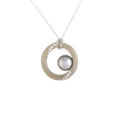 Mikimoto 18 Karat White Gold Diamond and Black Pearl Circle Pendant
