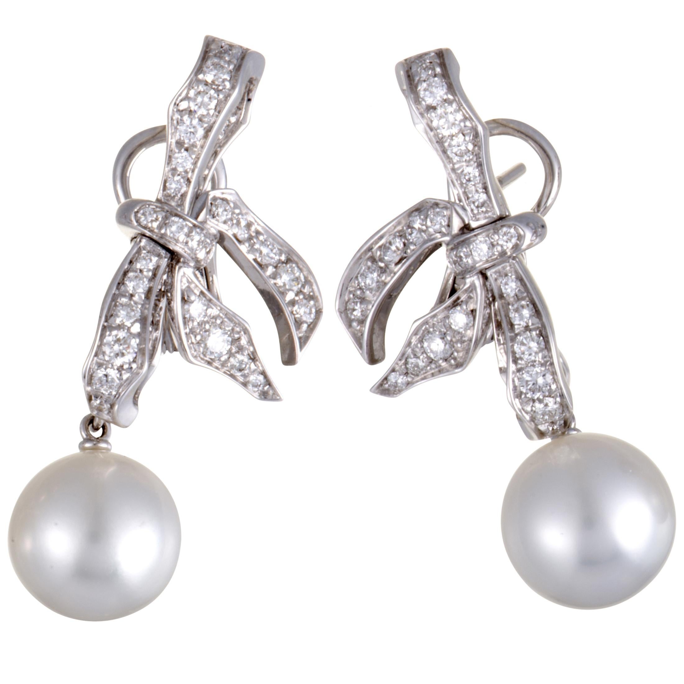 Mikimoto 18 Karat White Gold Diamond and White Pearl Dangle Bow Earrings