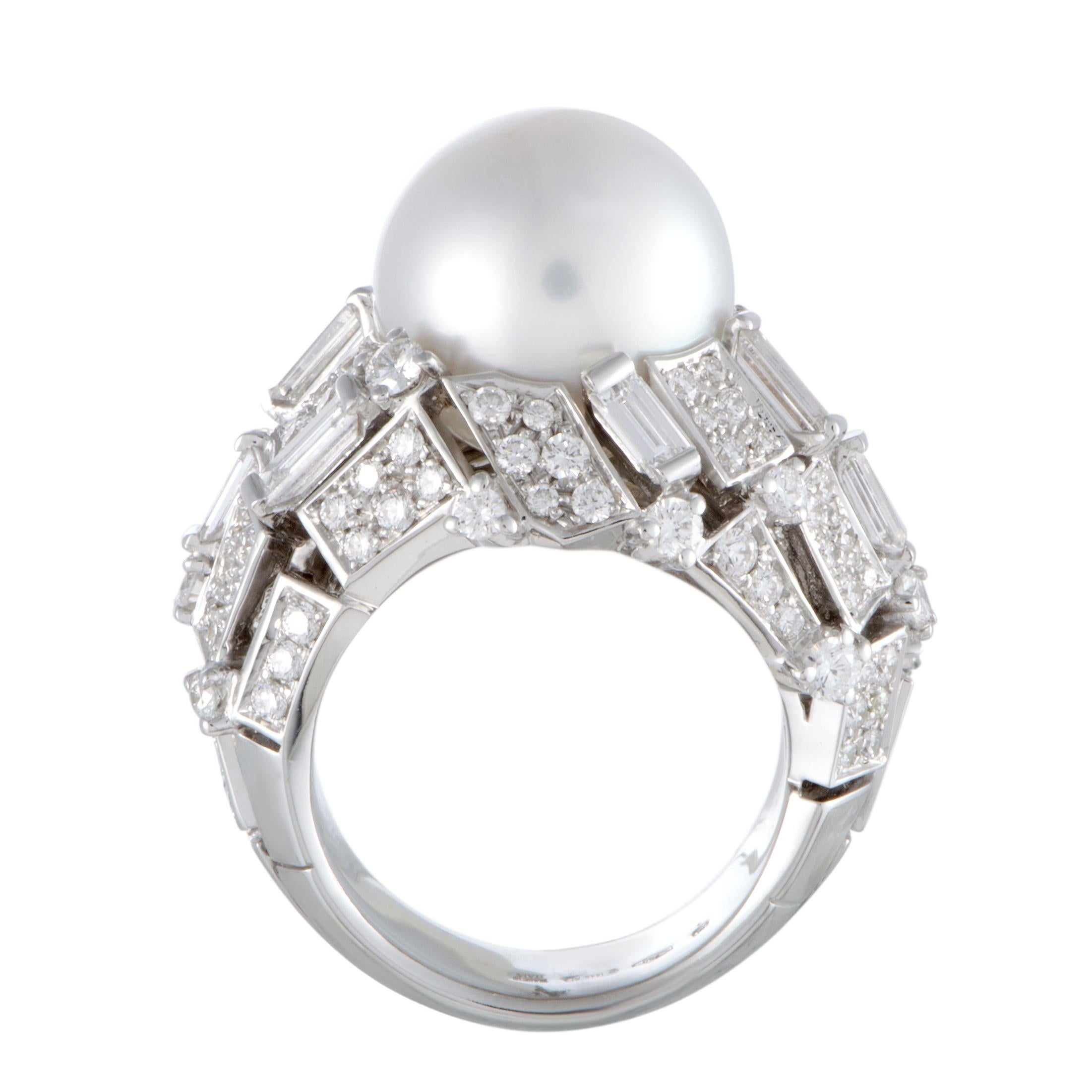 Sublime elegance and refined extravagance are embodied in this spectacular ring that boasts an incredibly eye-catching design topped off with irresistibly lustrous décor. The ring is presented by Mikimoto and it is masterfully crafted from