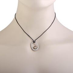 Mikimoto Anhänger aus 18 Karat Weißgold mit Volldiamant und schwarzer Perle