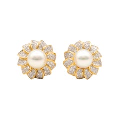 Mikimoto Pearl and Diamond Flower Earrings in 18K yellow gold.