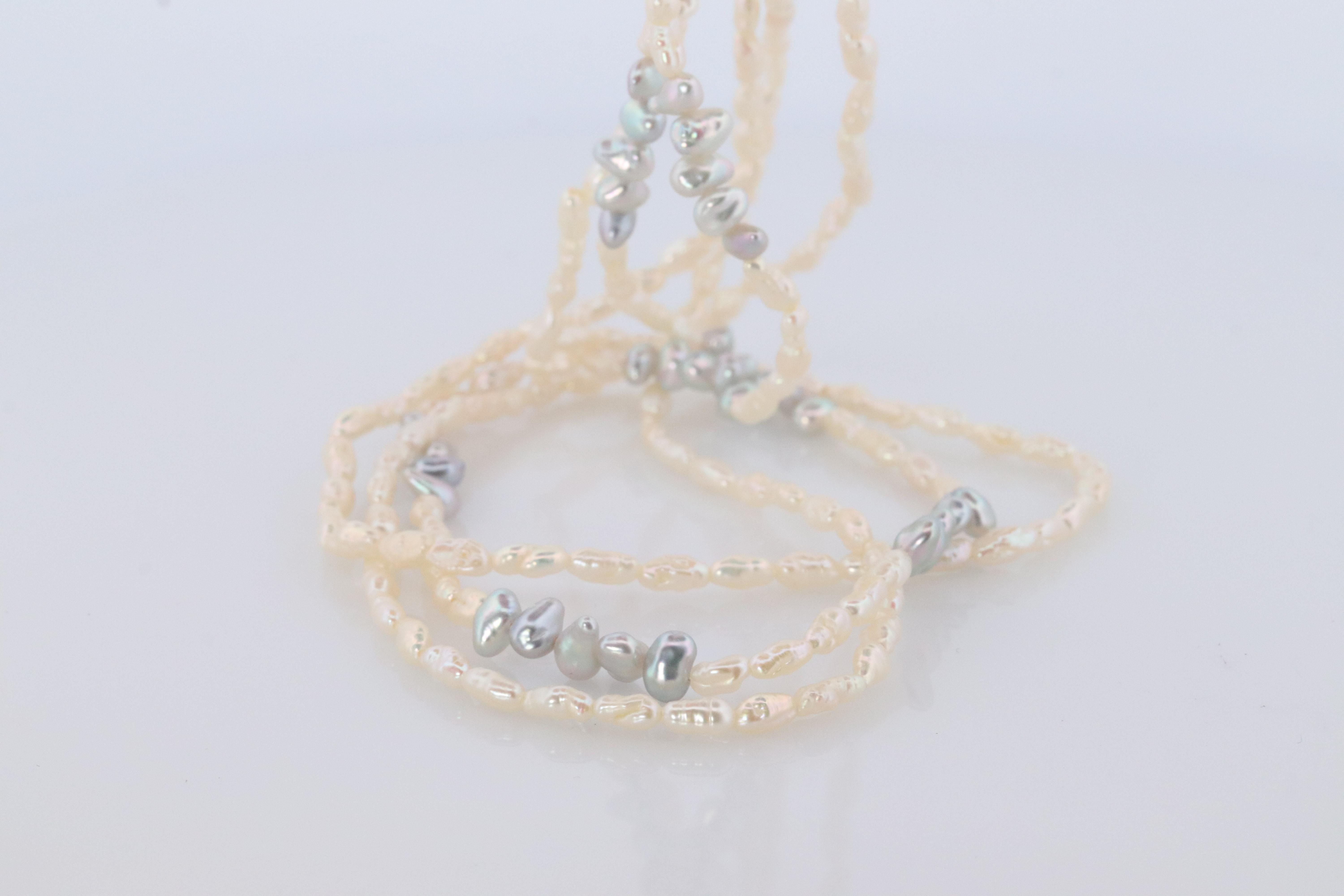 MIKIMOTO 18k Gold Pearl Necklace. Rice Pearls Multi Strand Necklace. In Good Condition For Sale In Port Charlotte, FL