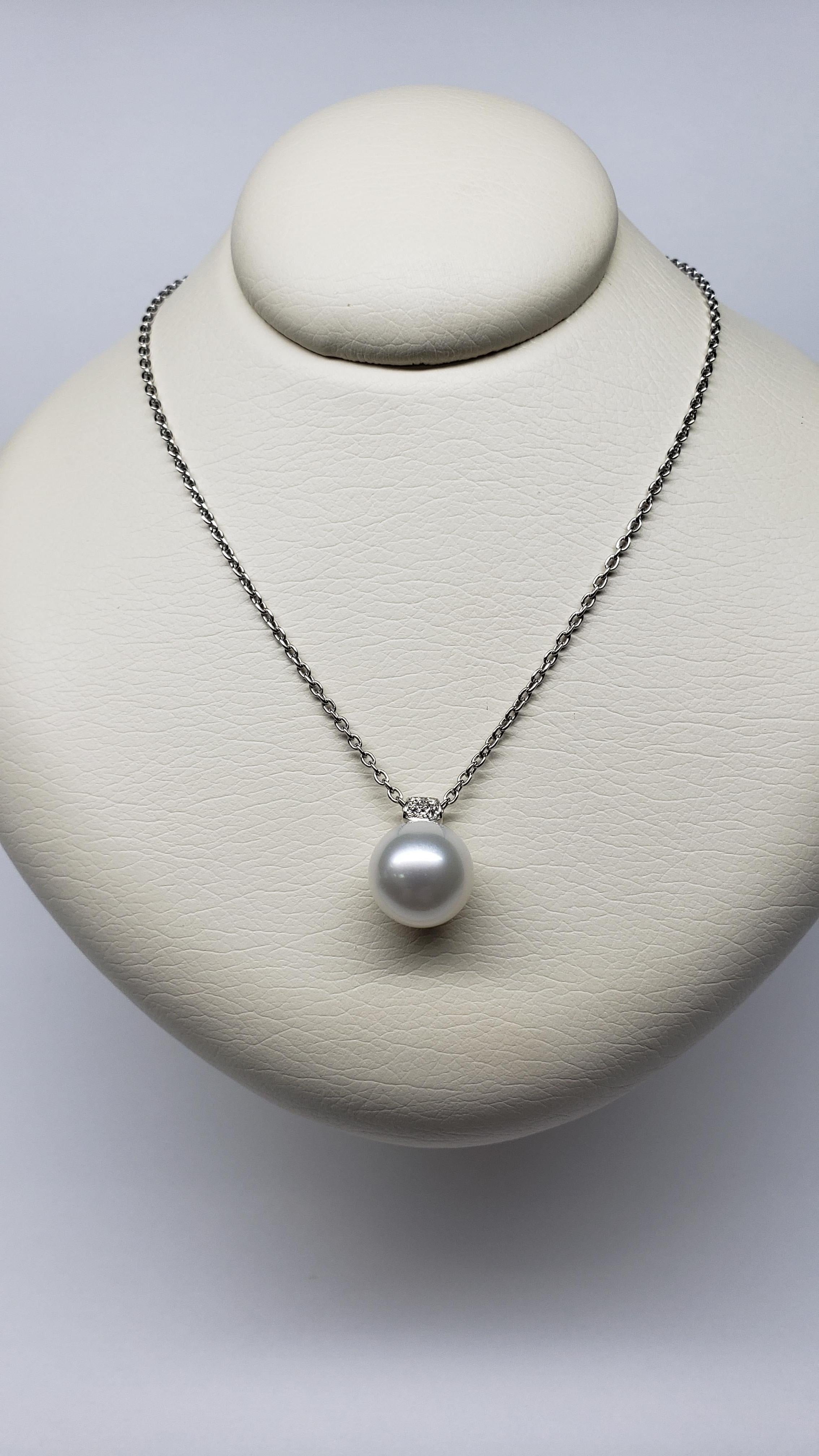 This Mikimoto, 18K, White Gold, 11mm, White South Sea Pearl Pendant features an A+ quality, cultured south sea pearl. It is adorned with an 18K white gold and diamond bale. Attached is a 31.5