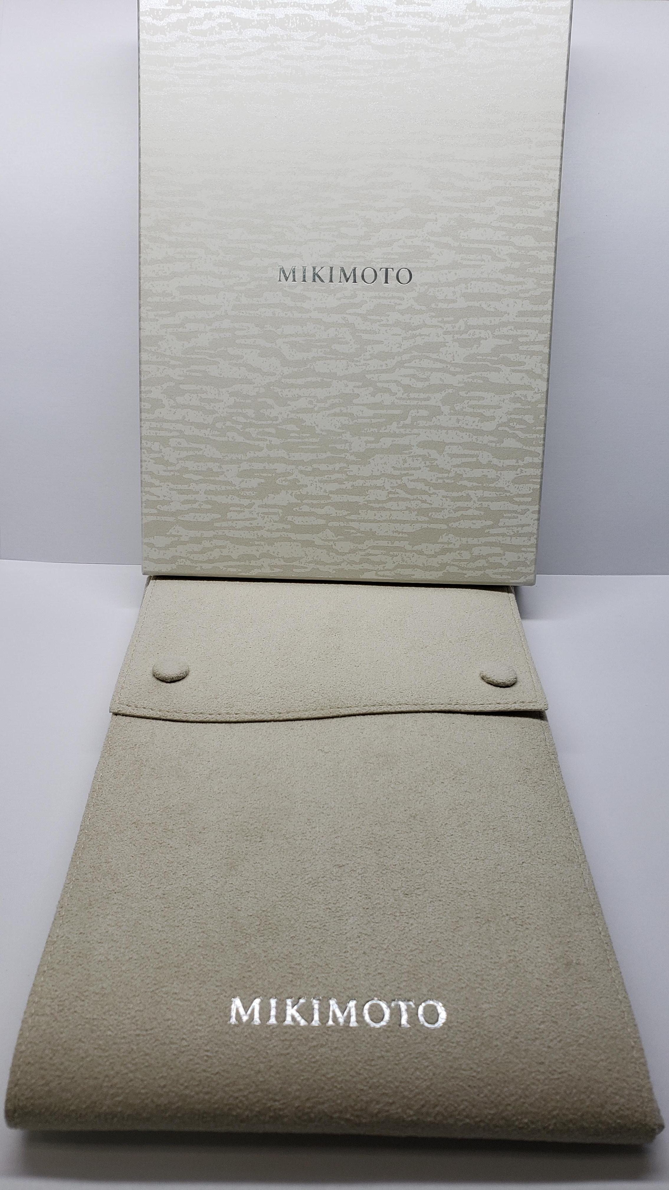 Uncut Mikimoto 18 Karat White Gold White South Sea Pearl Pendant For Sale